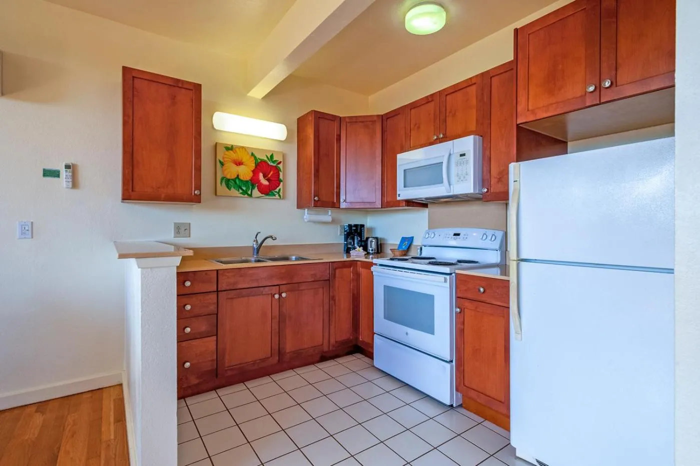 Kitchen or kitchenette in Poipu Plantation Vacation Rentals