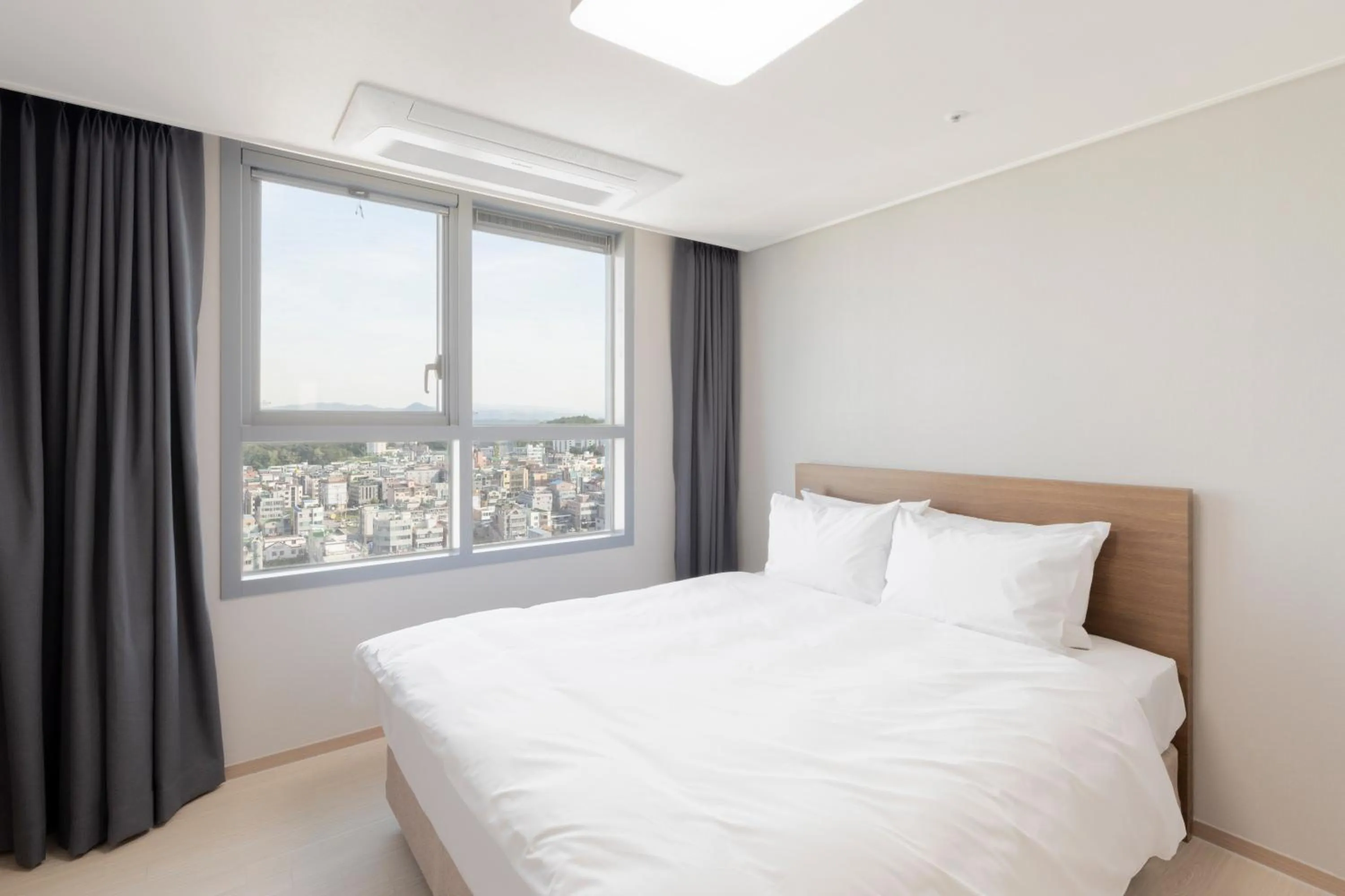 Bed in Donghae Oceancity Residence Hotel