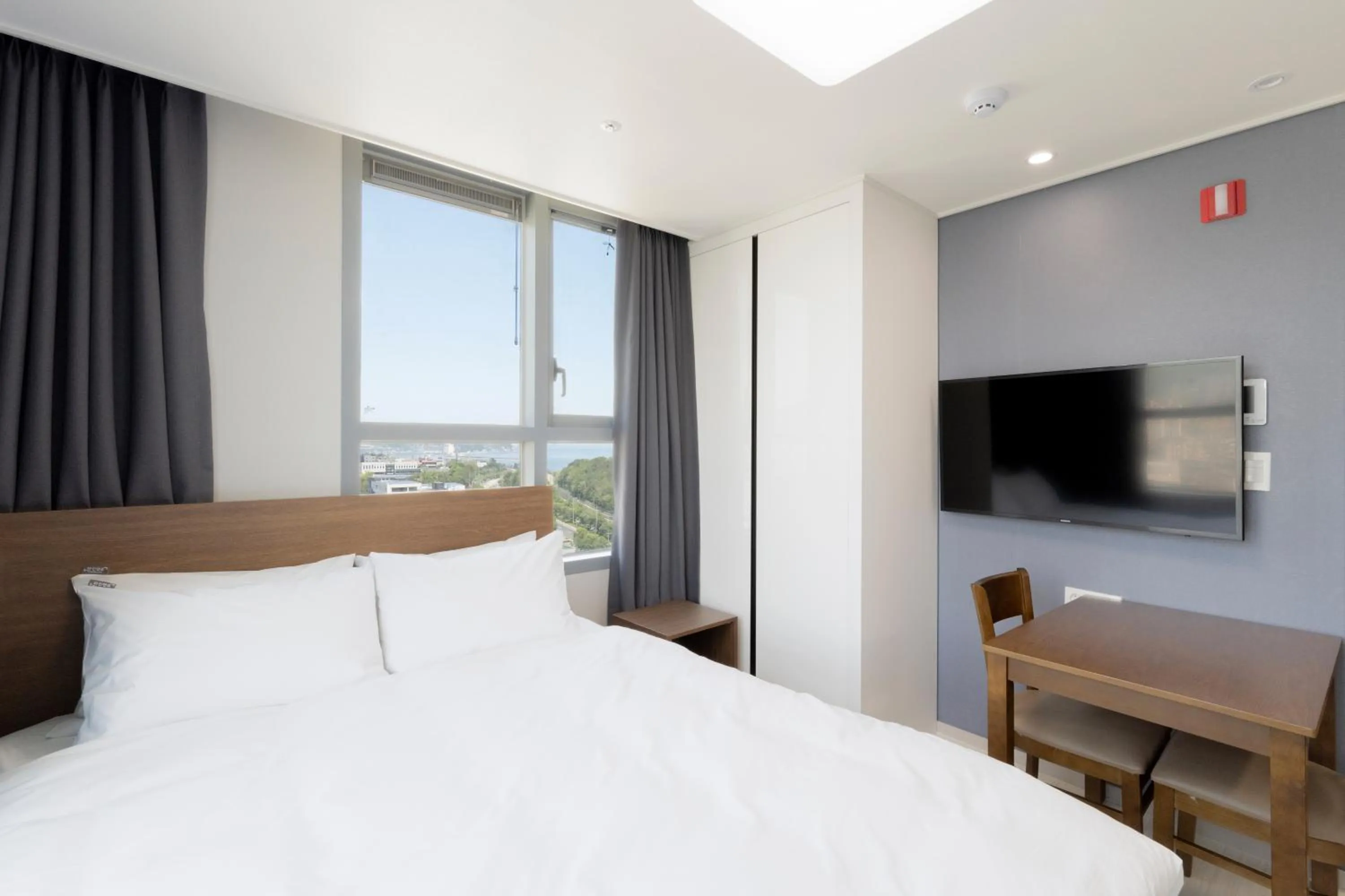 Bed in Donghae Oceancity Residence Hotel