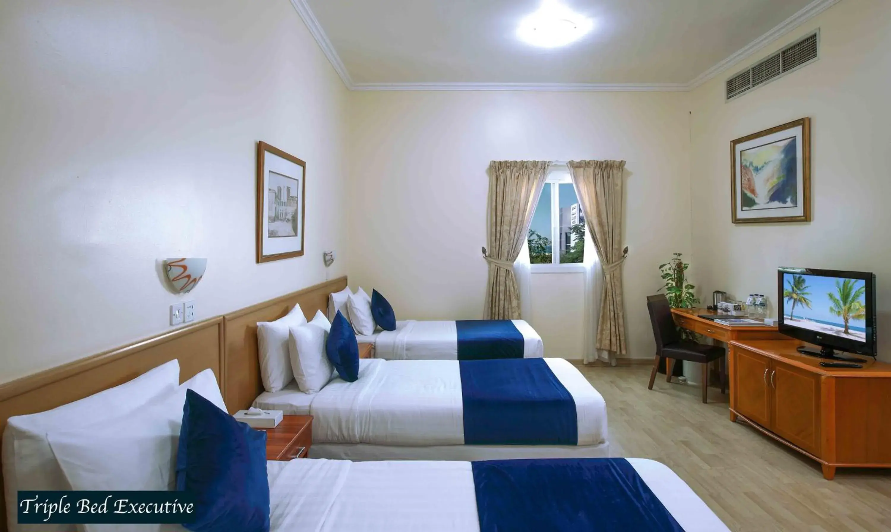 TV and multimedia, Bed in Al Seef Hotel TV and multimedia, Bed in Al Seef Hotel