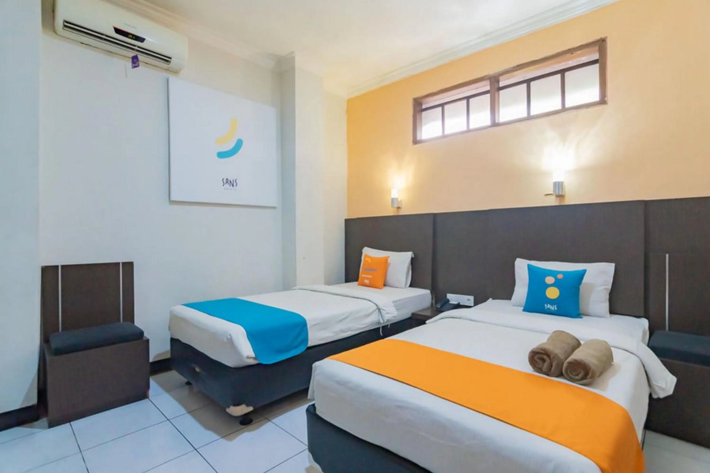 Bedroom in Sans Hotel Cihampelas Bandung