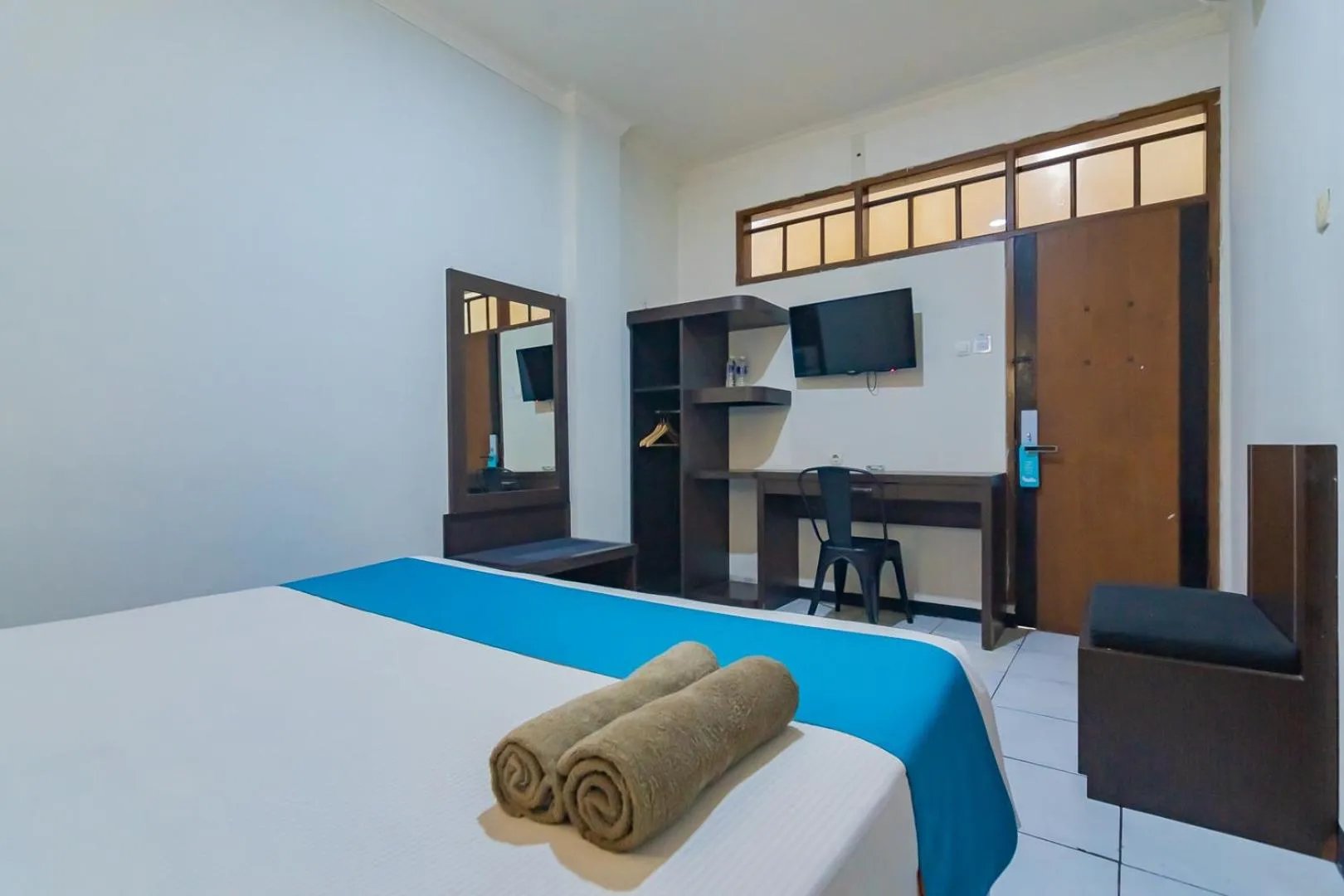 Bedroom in Sans Hotel Cihampelas Bandung