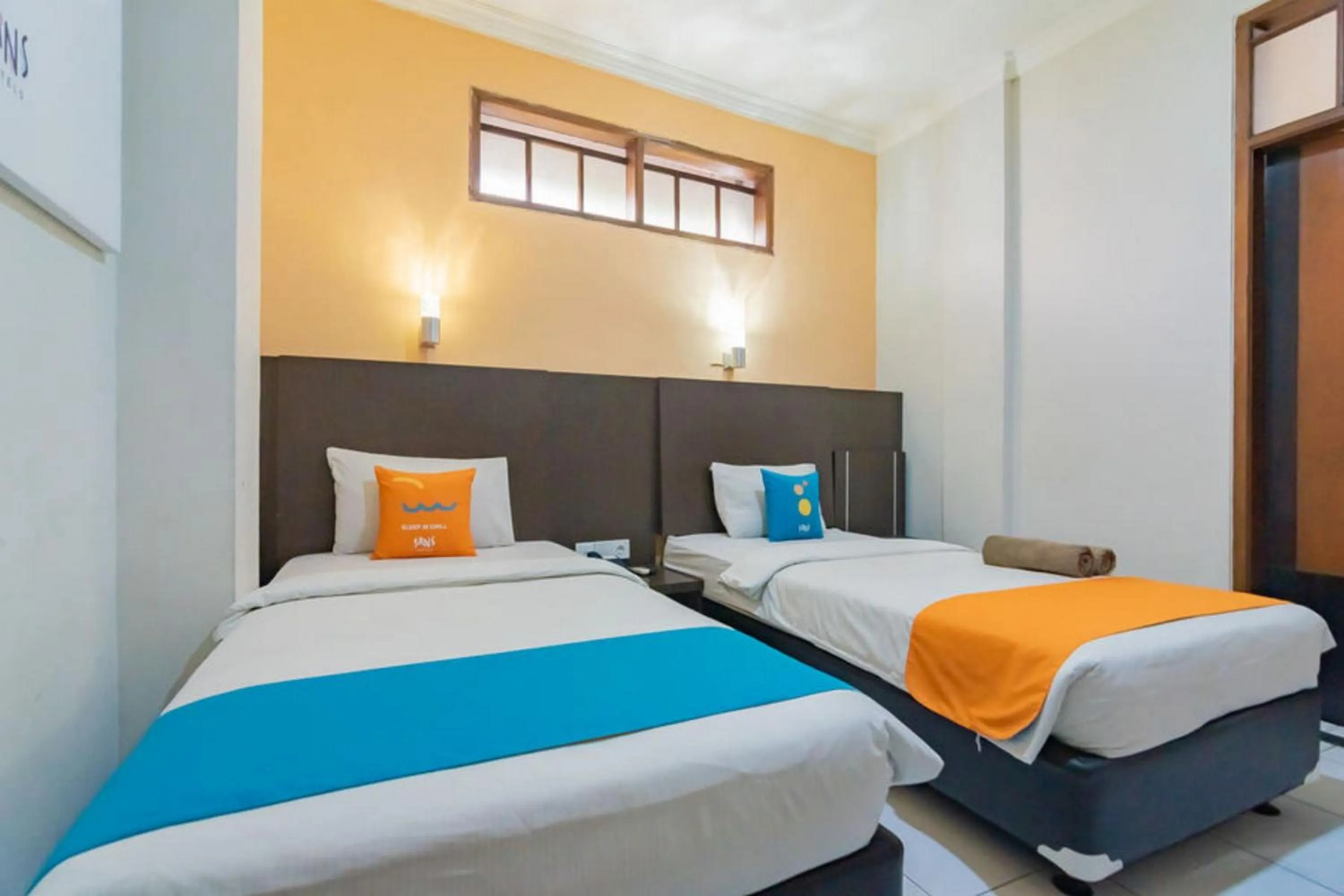 Bedroom in Sans Hotel Cihampelas Bandung