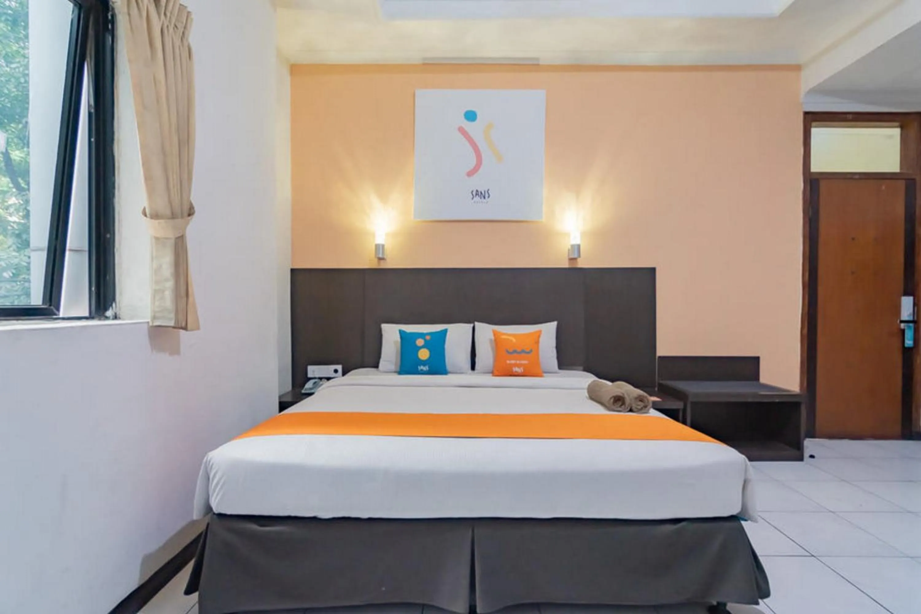 Bedroom in Sans Hotel Cihampelas Bandung