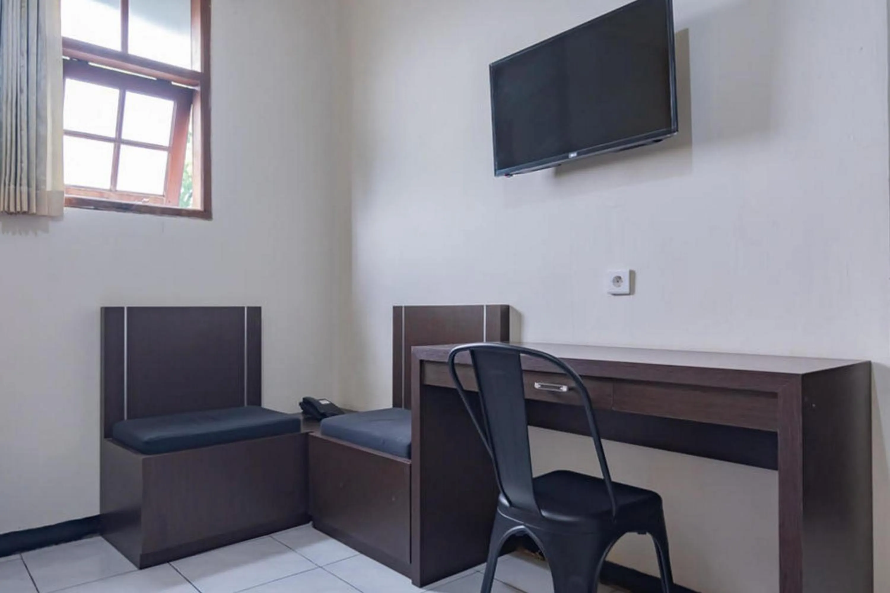 Bedroom in Sans Hotel Cihampelas Bandung