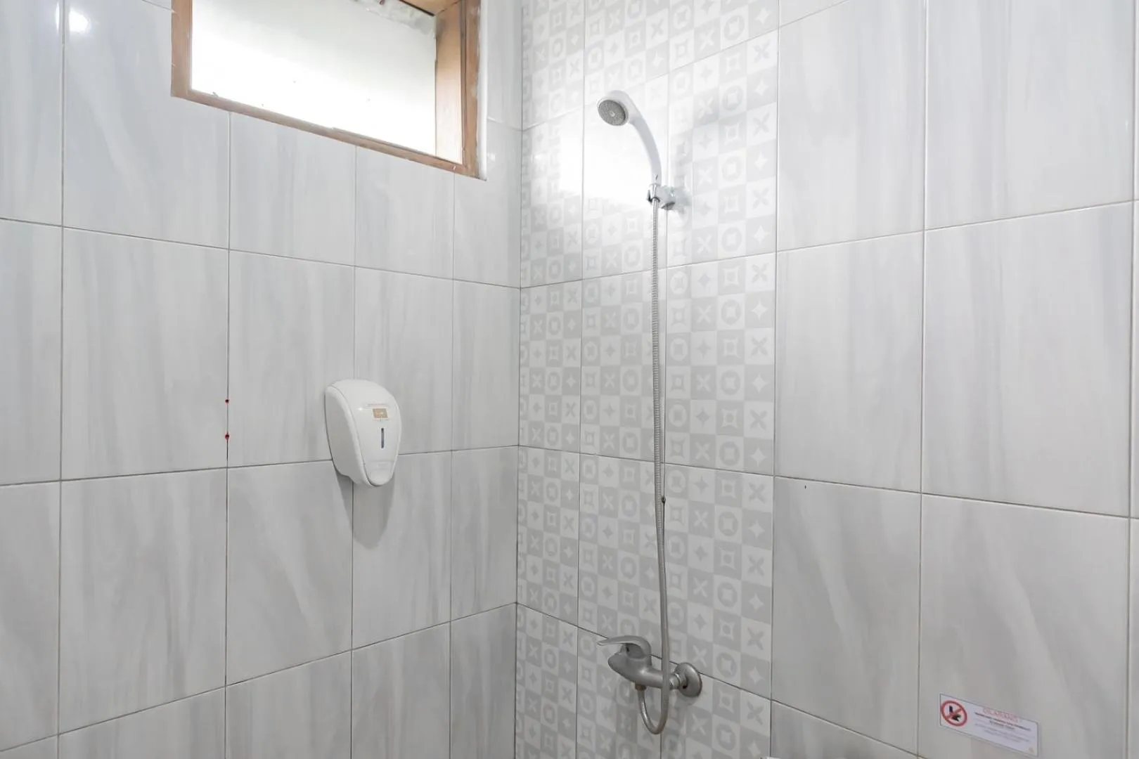 Bathroom in Sans Hotel Cihampelas Bandung