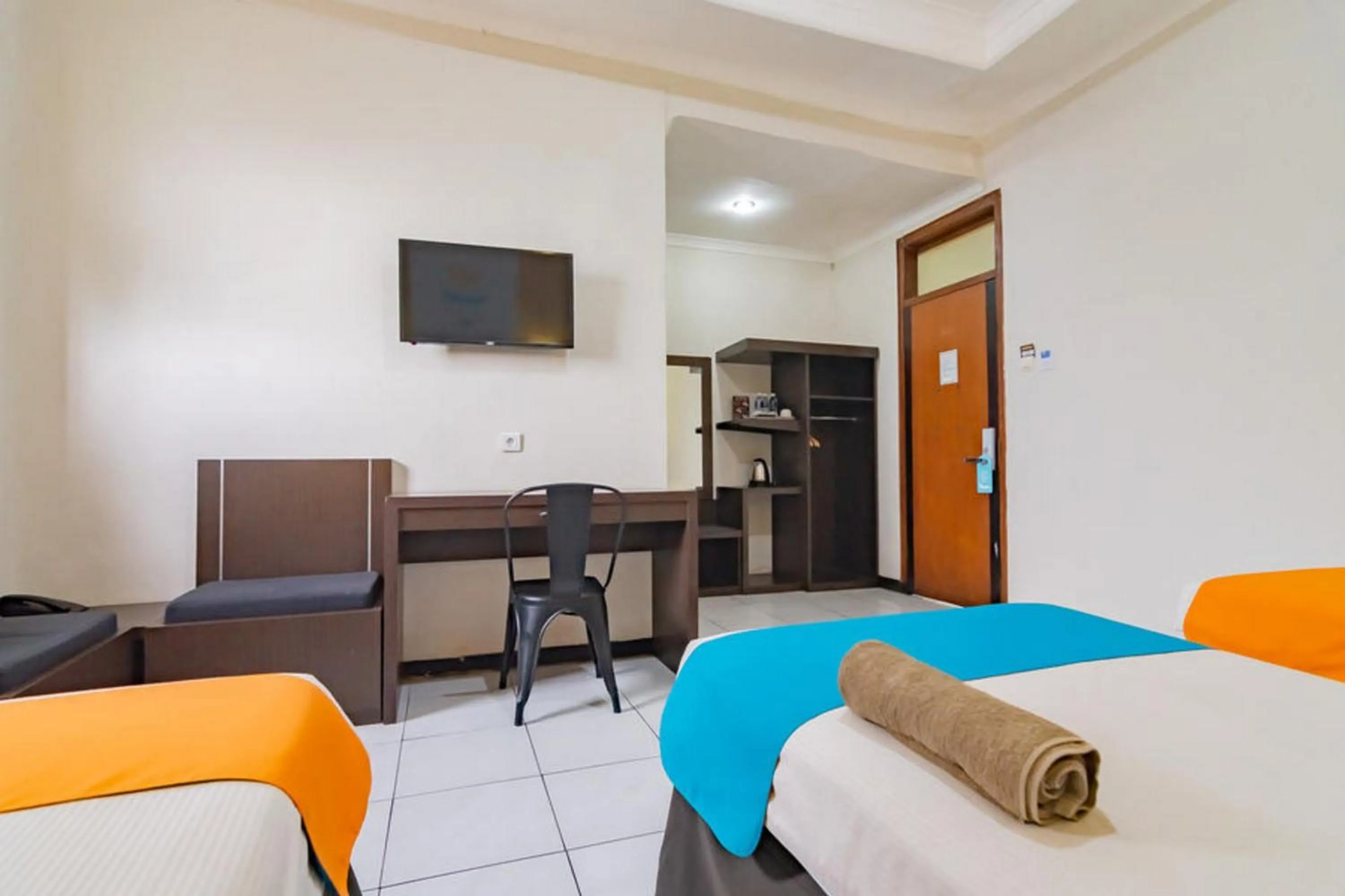 Bedroom in Sans Hotel Cihampelas Bandung