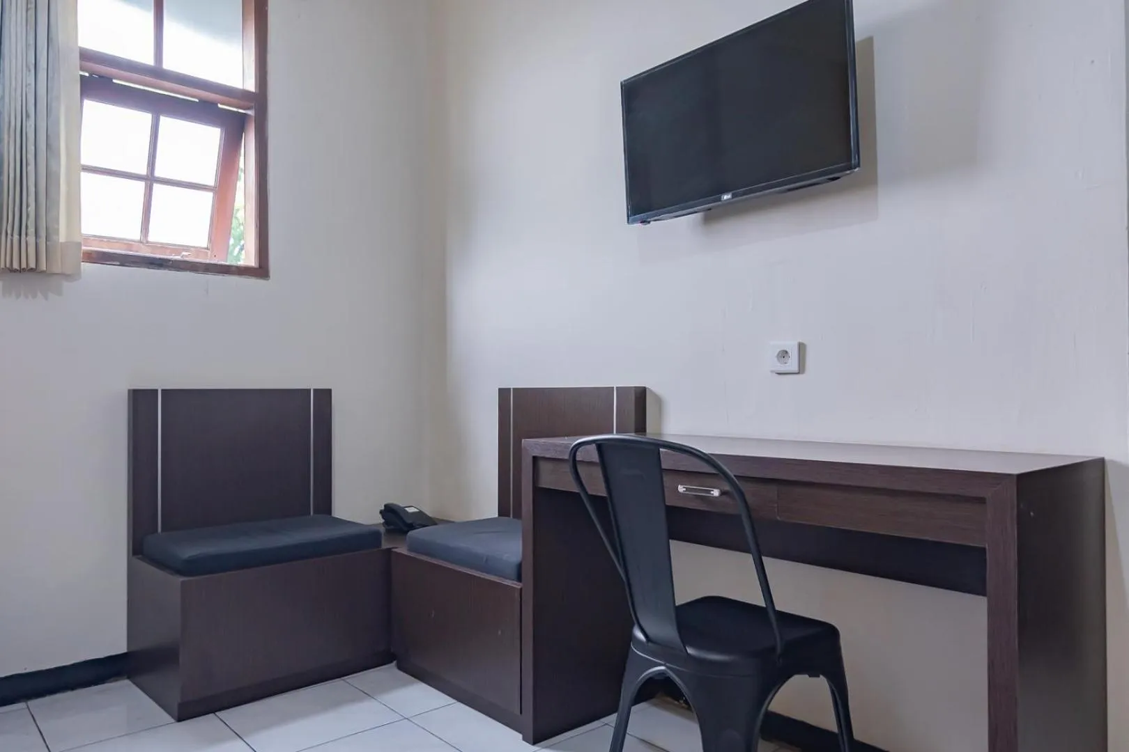 Bedroom in Sans Hotel Cihampelas Bandung