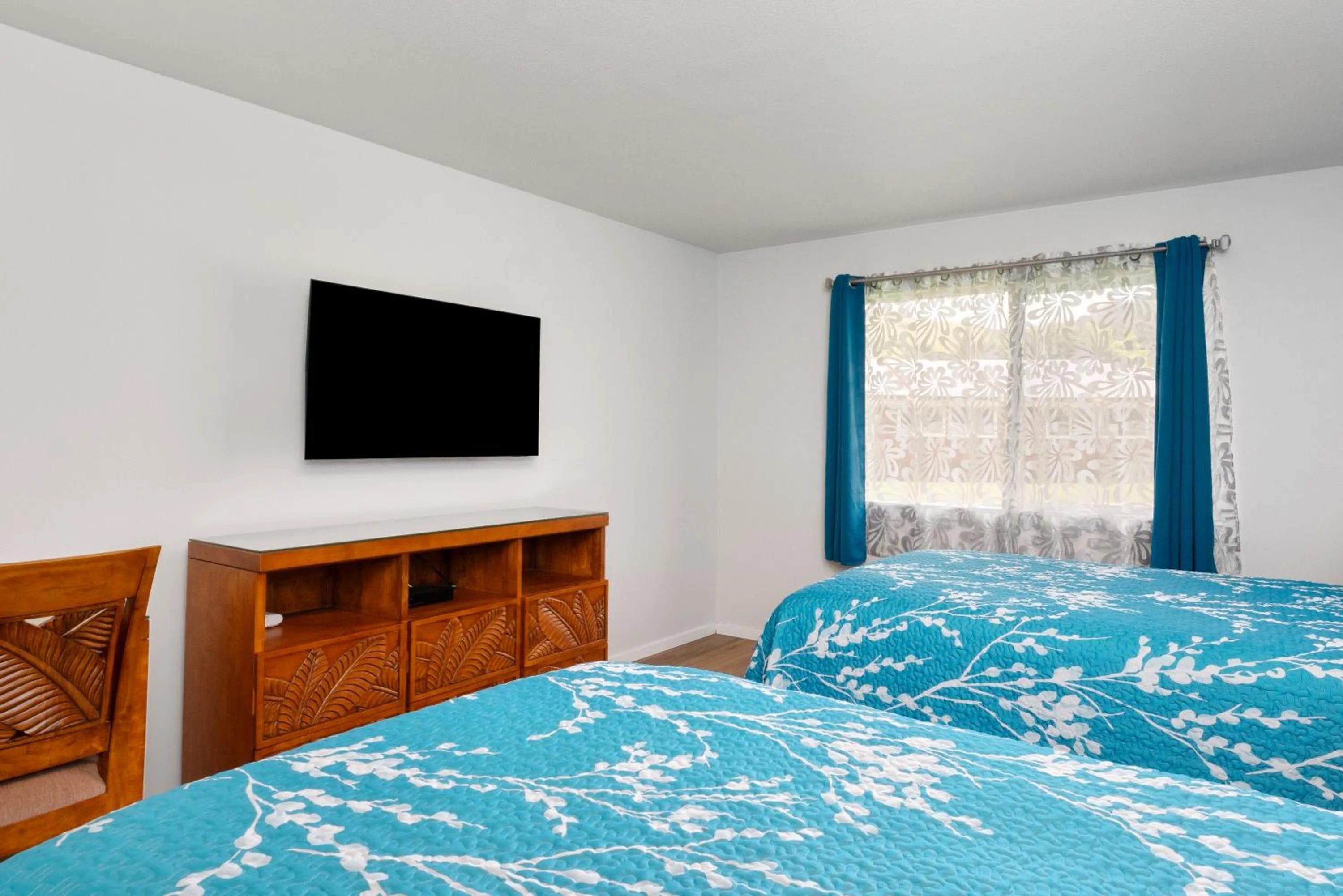 Bed in Castle Waimea Country Lodge