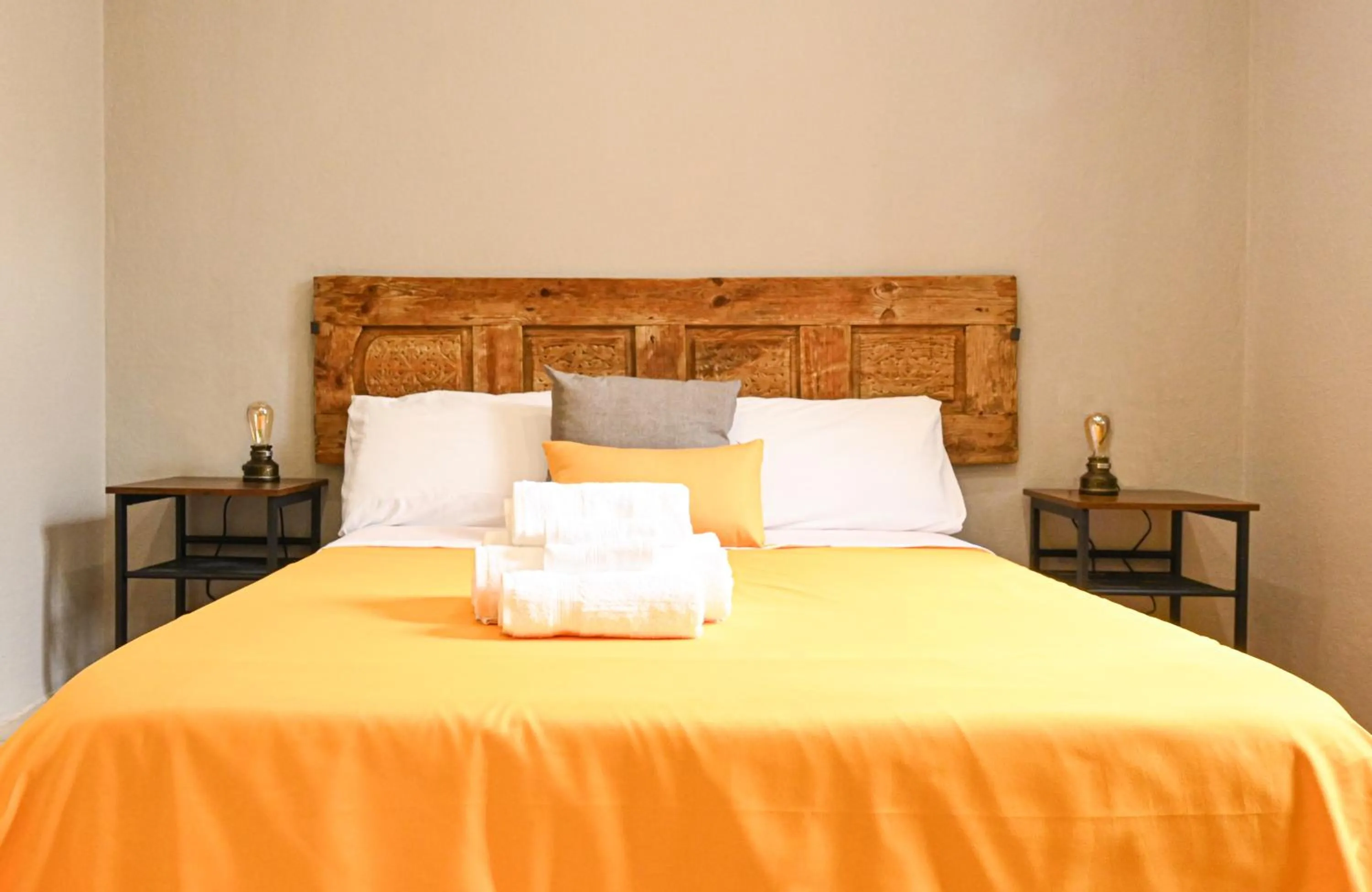 Bed in Urban Blue Guest House