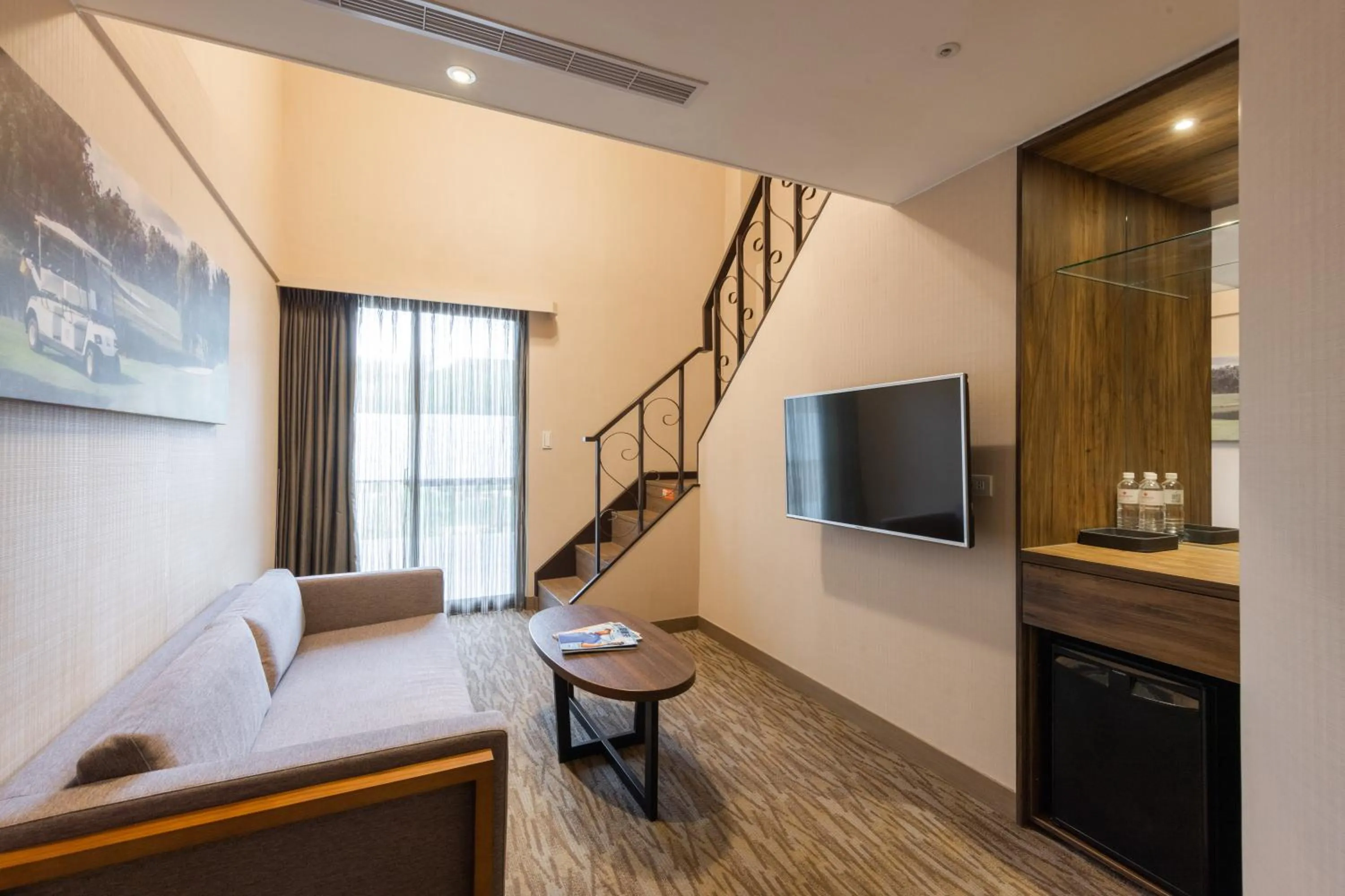 Living room, Bed in Taoyuan Yuehua Hotel & Golf Club