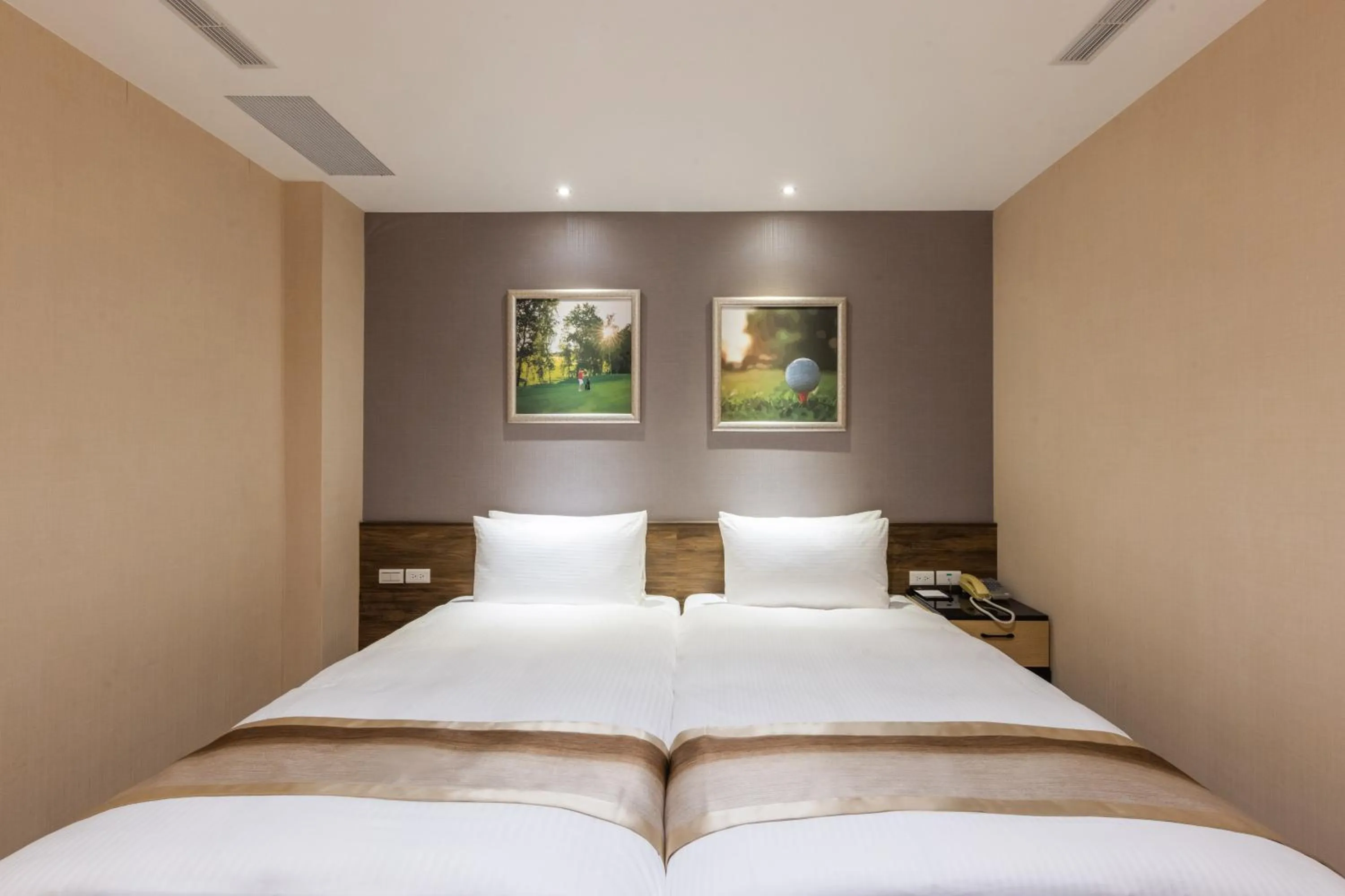 Bed in Taoyuan Yuehua Hotel & Golf Club