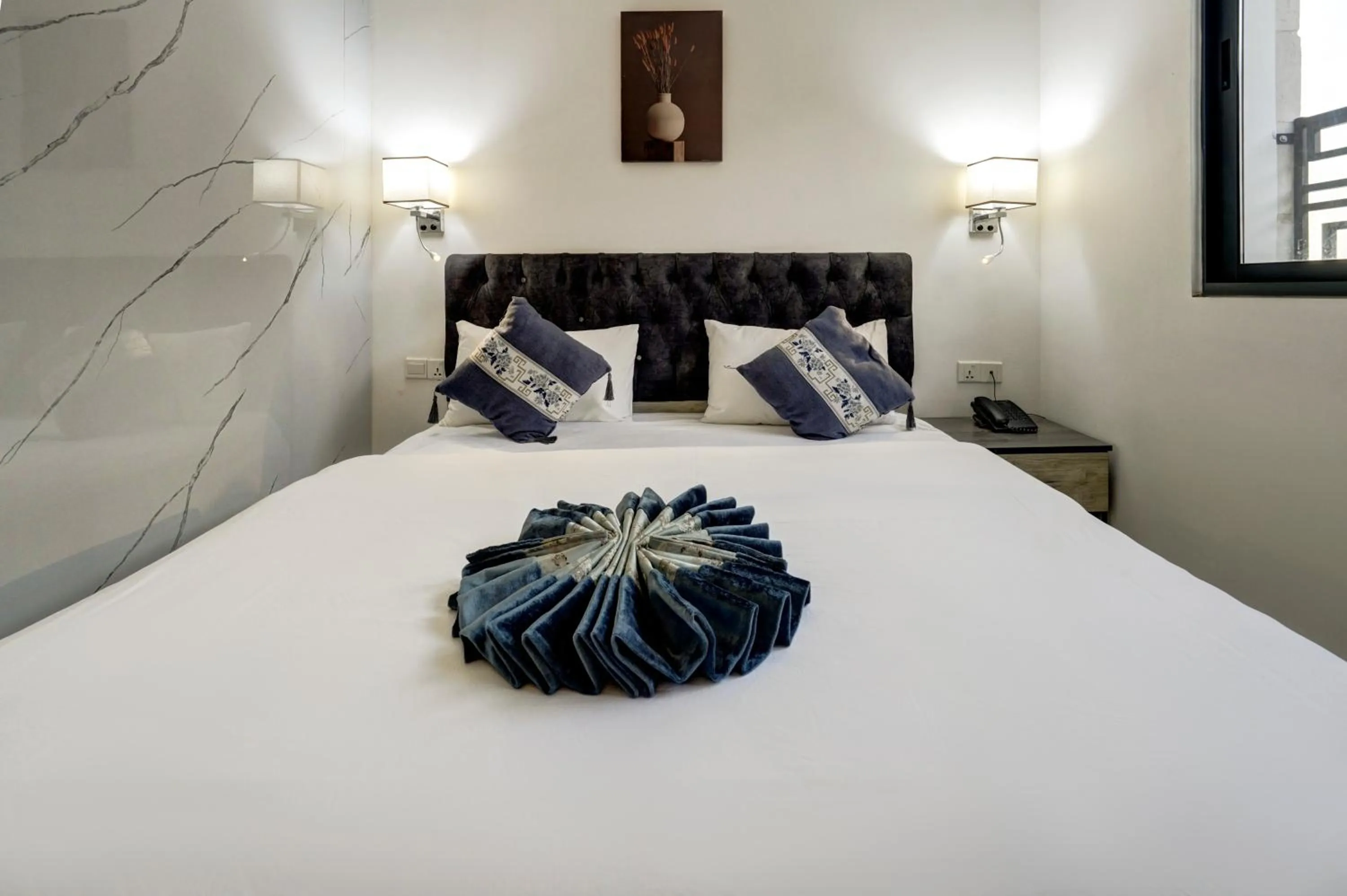 Bed in Down Town Hotel