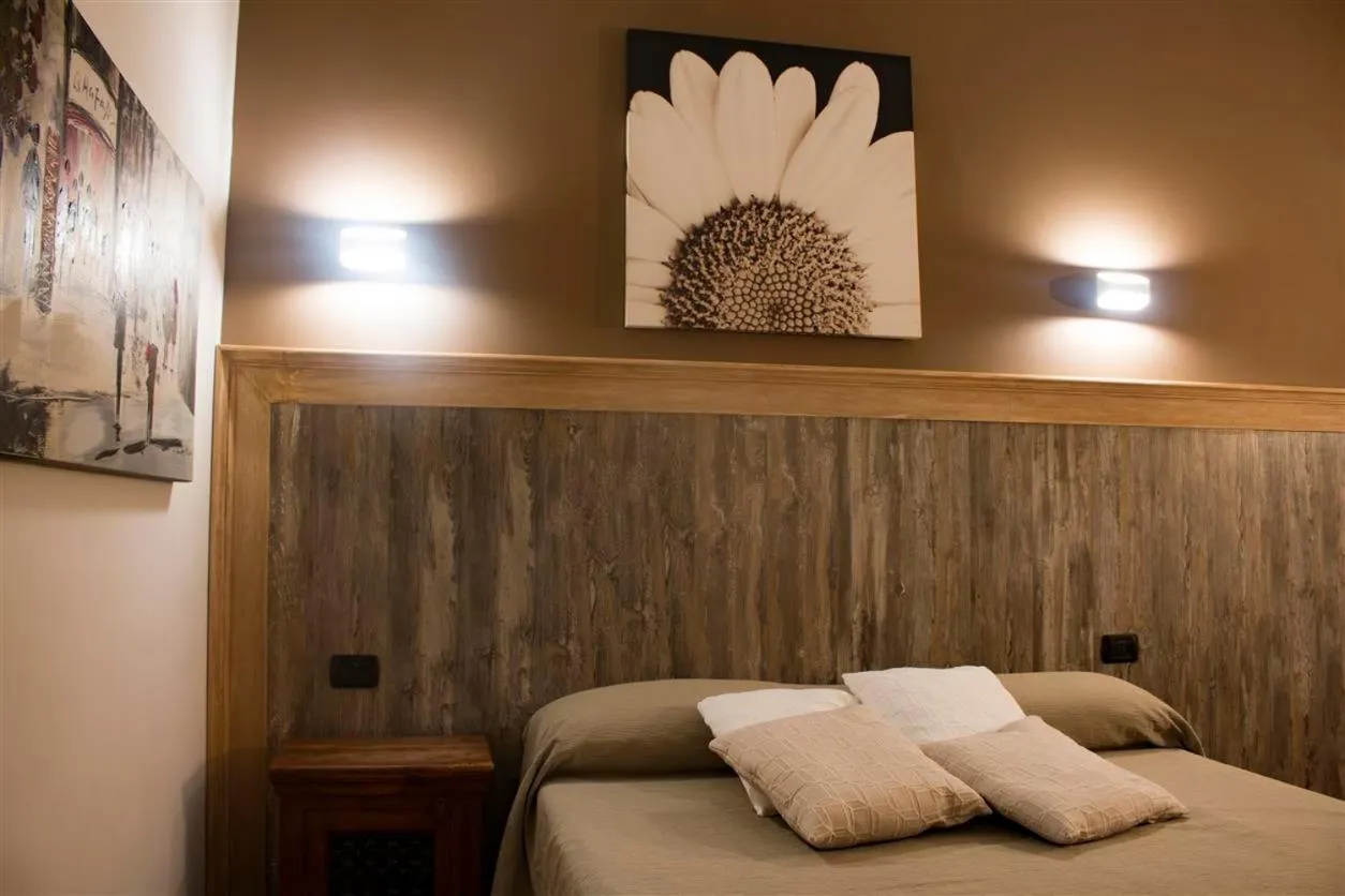 Bed in Hotel Mediterraneo