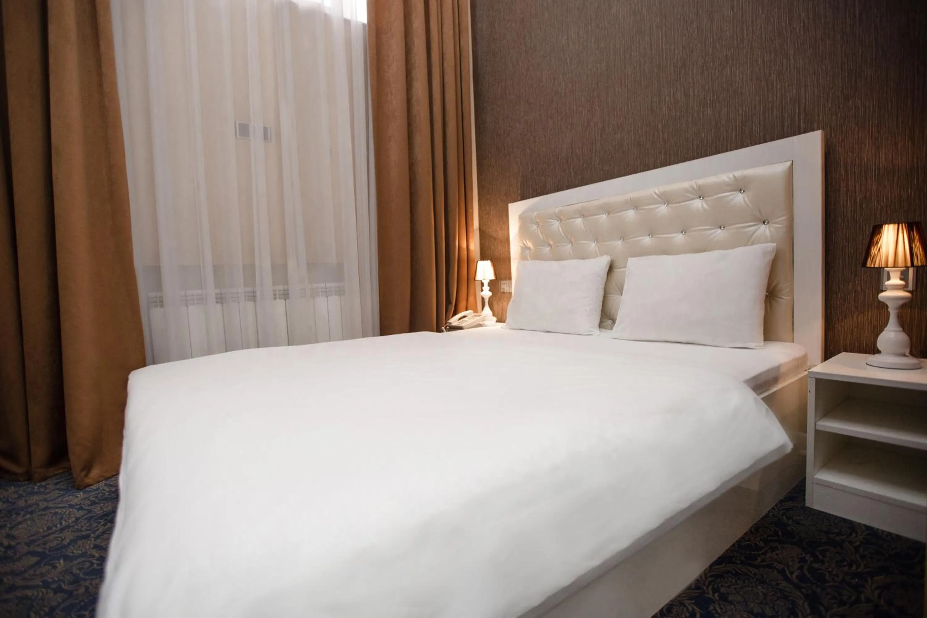 Bed in Admiral Hotel