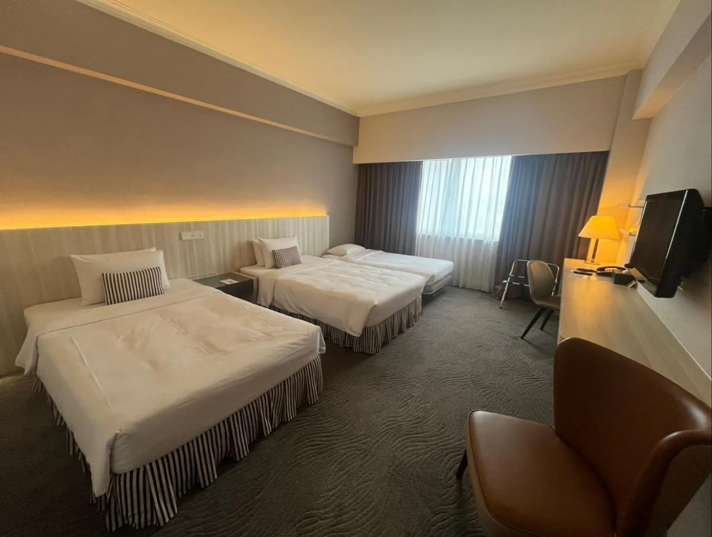 Bed in Caesar Park Hotel Taipei