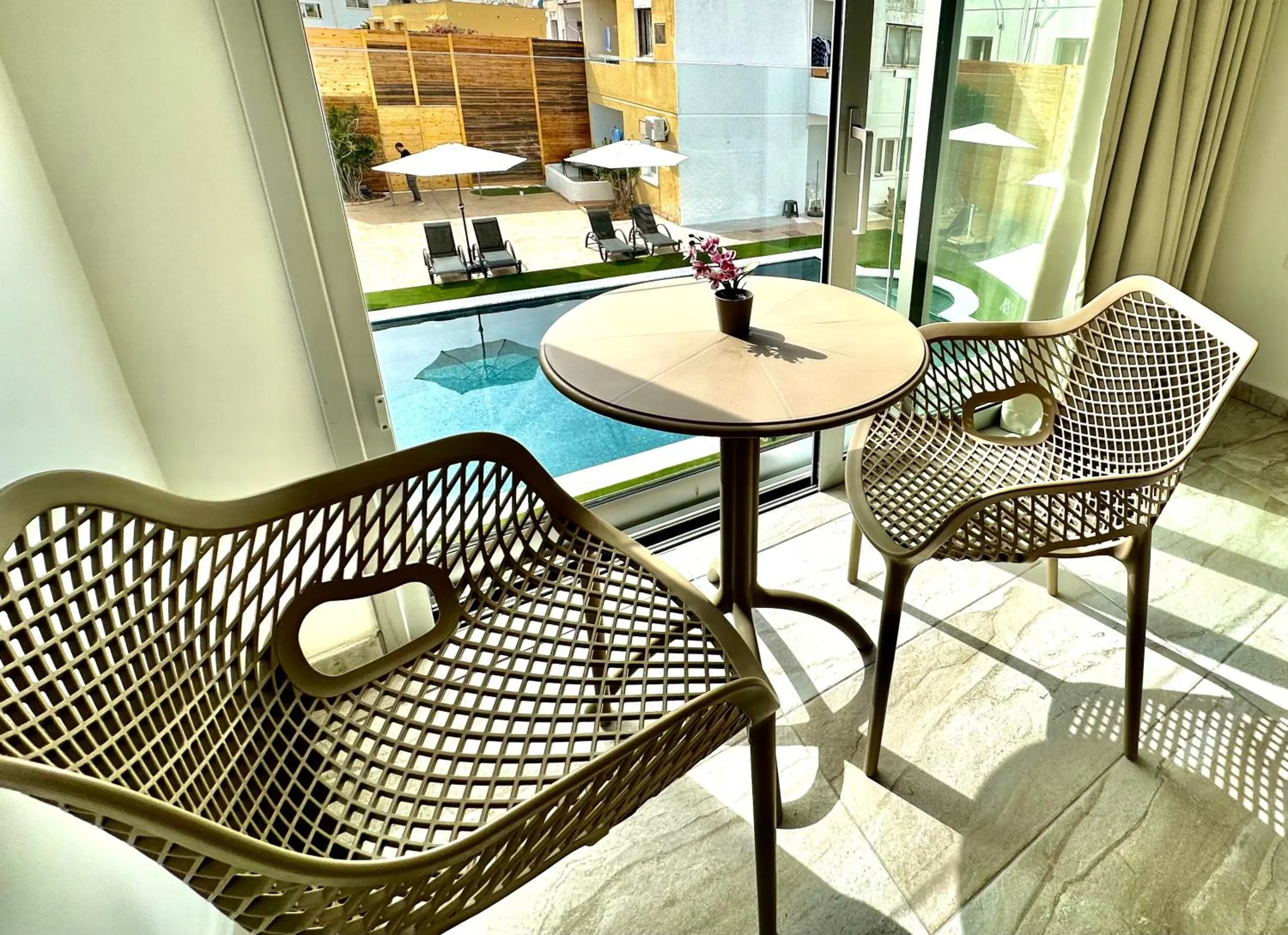 Seating area in Sun Plaza Suites - Adults Only