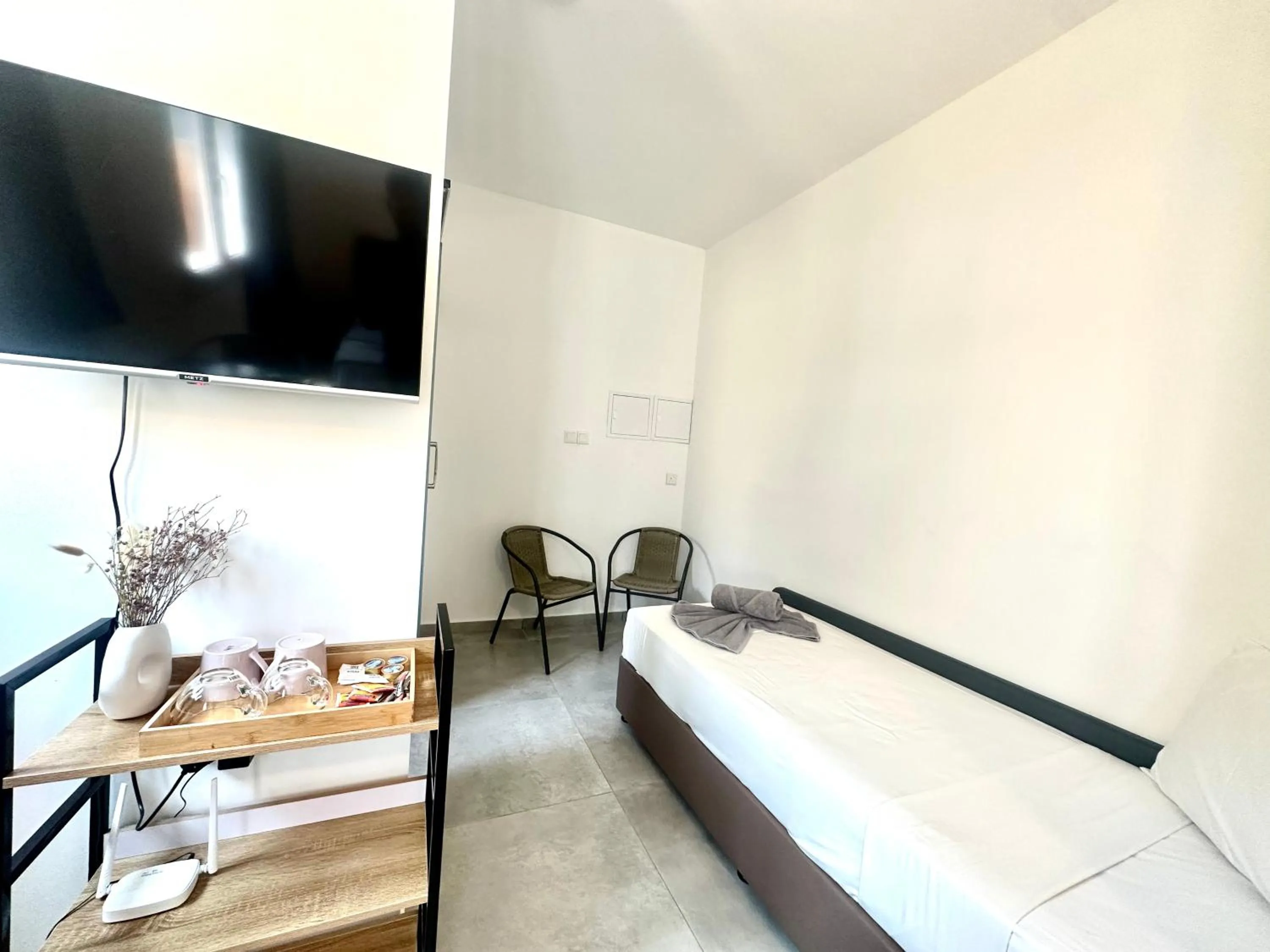 Bed in Sun Plaza Suites - Adults Only