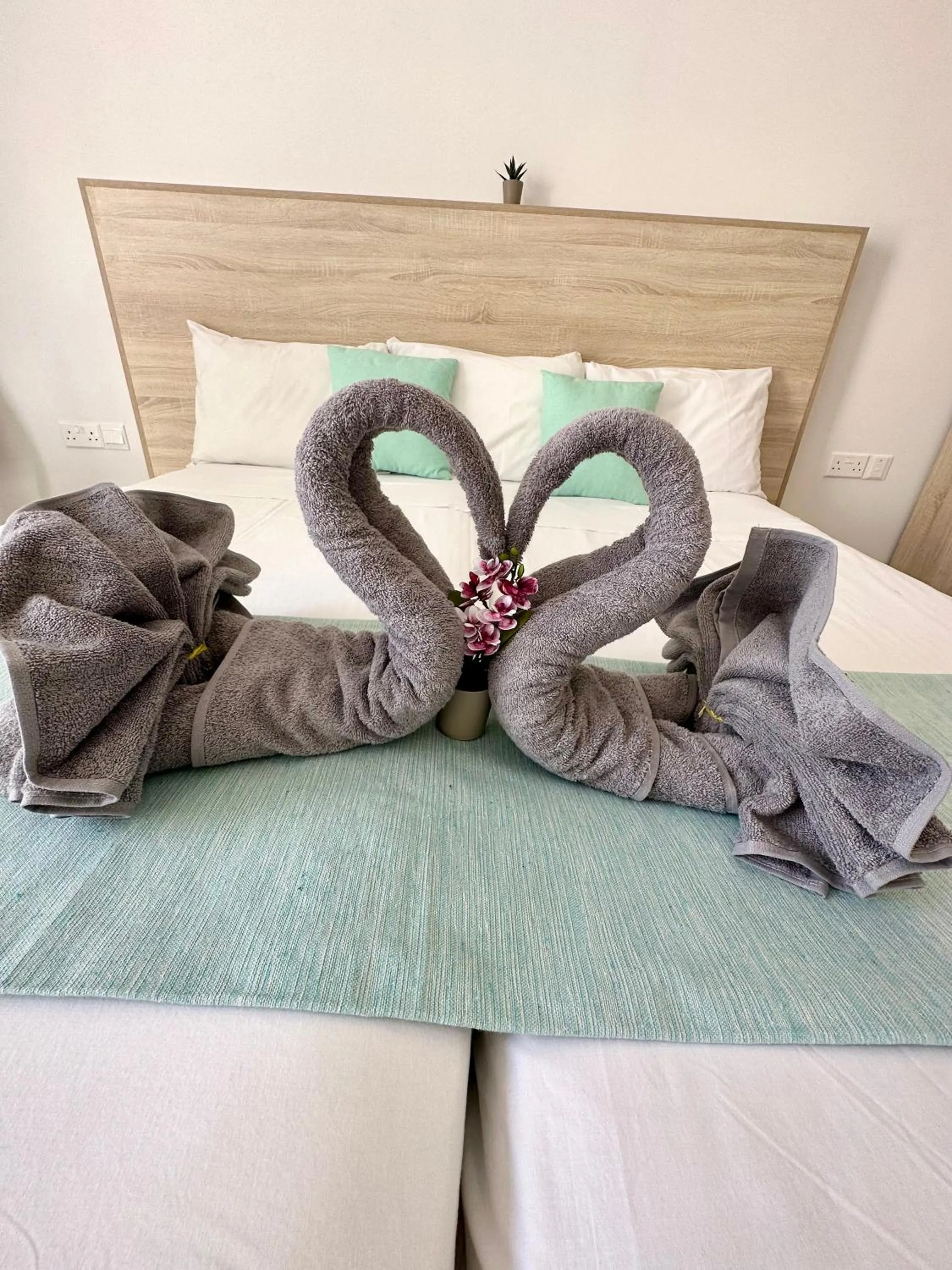 Bed in Sun Plaza Suites - Adults Only