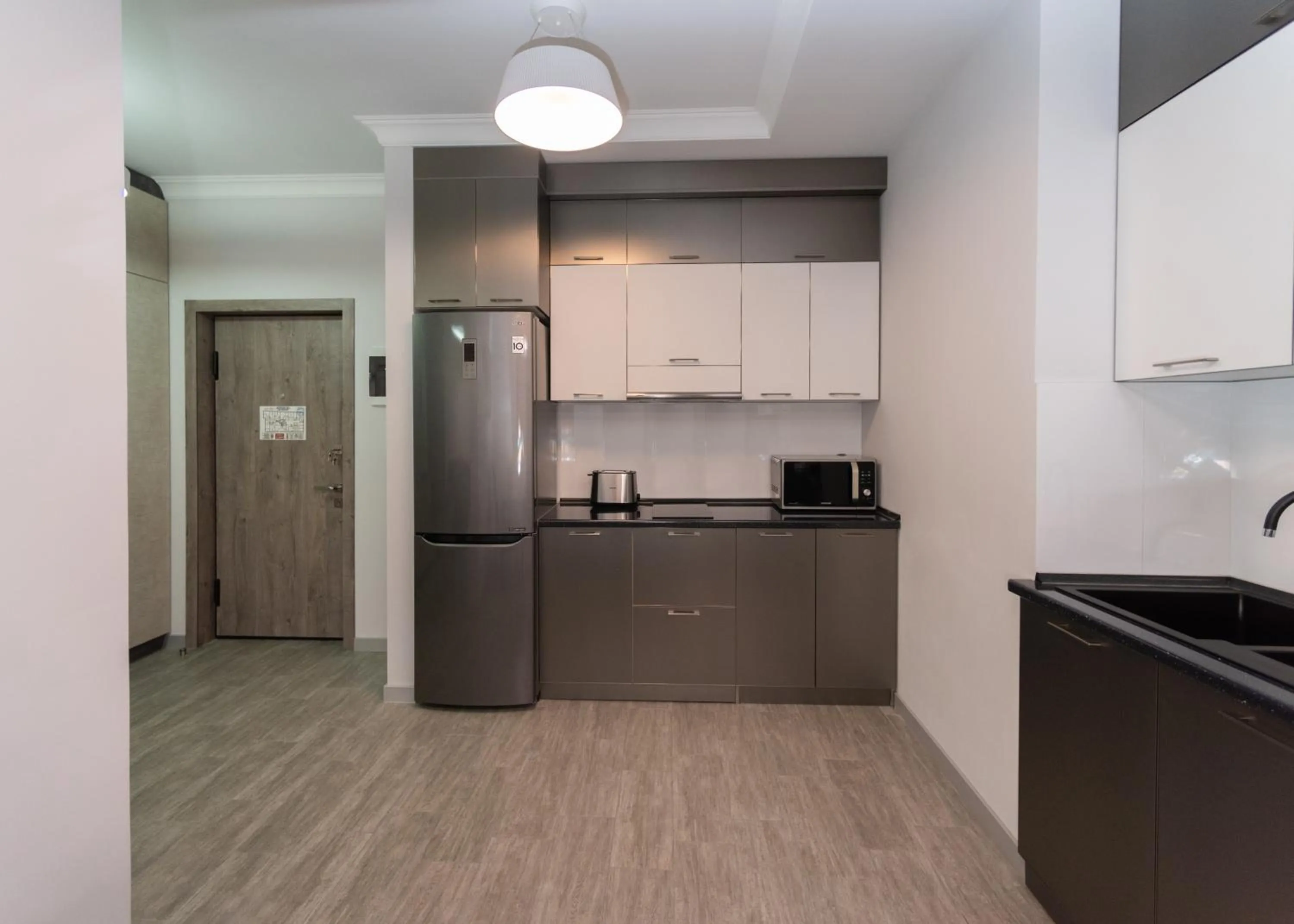 Kitchen or kitchenette in Downtown Suites Yerevan