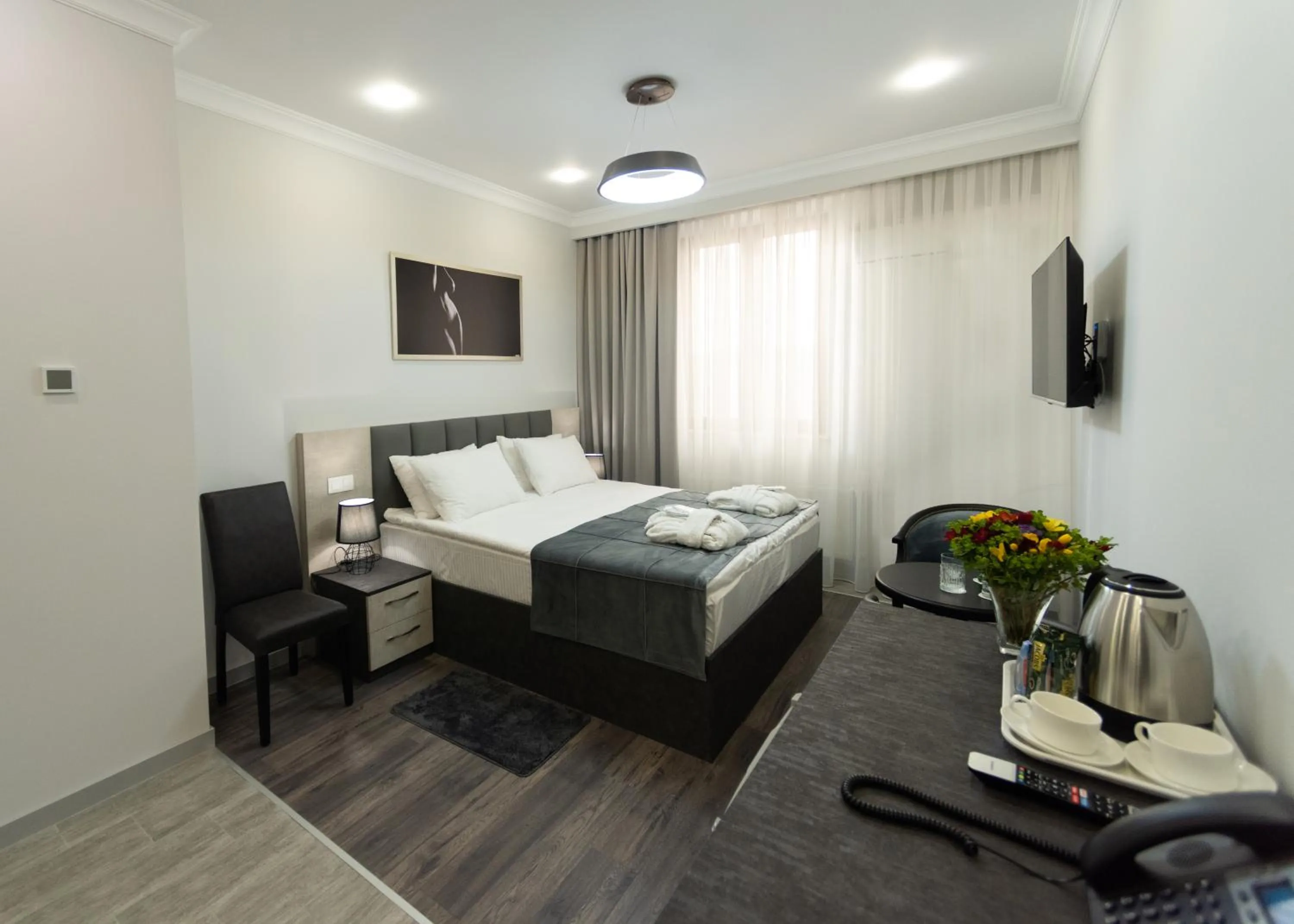 Photo of the whole room, Bed in Downtown Suites Yerevan