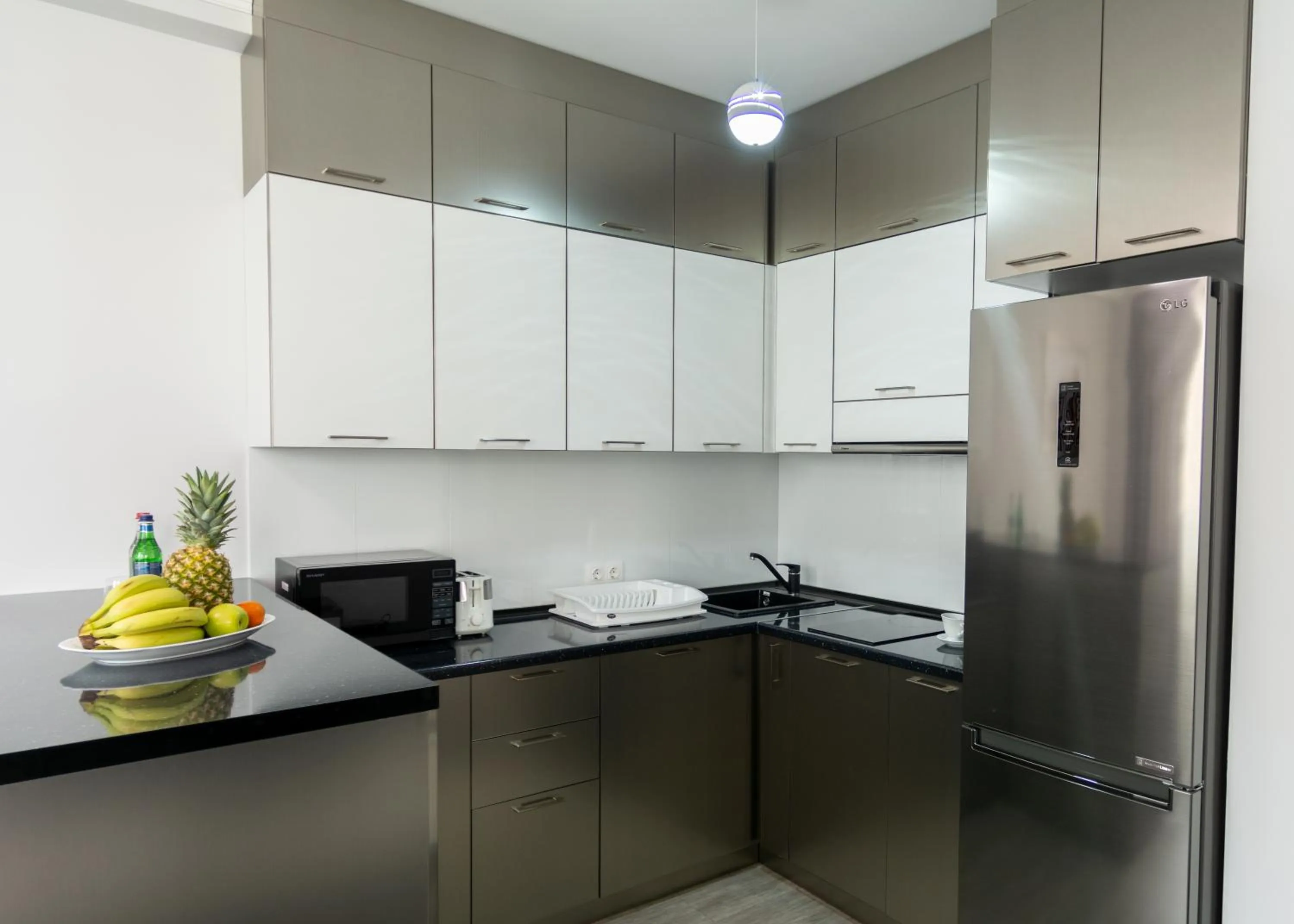 Kitchen or kitchenette in Downtown Suites Yerevan