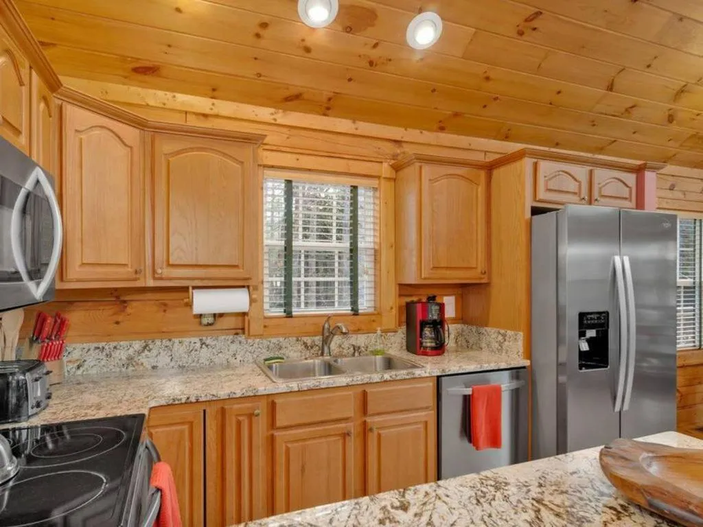 Kitchen or kitchenette in Soco Serene Cabin in the Heart of Maggie Valley