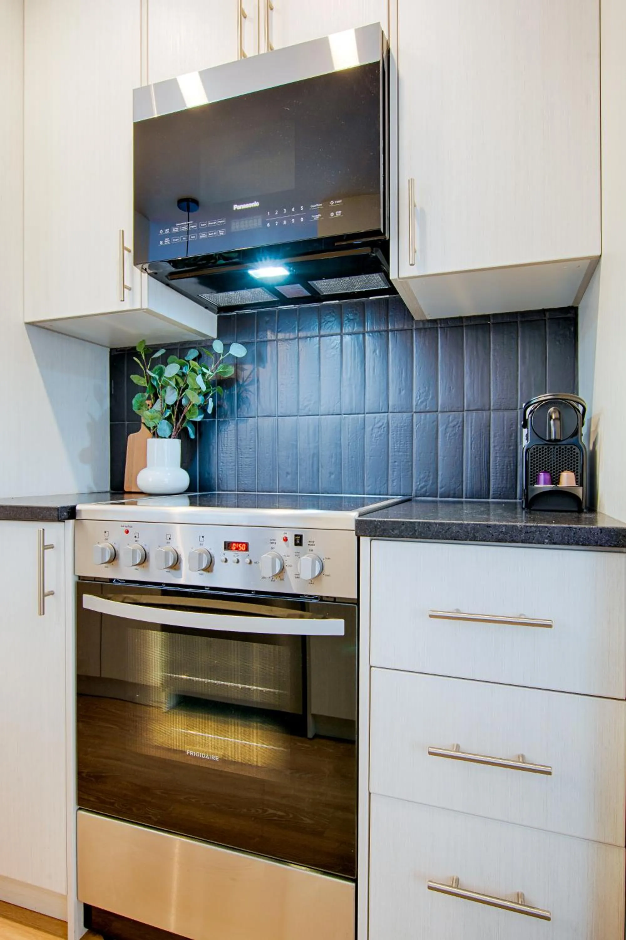 Kitchen or kitchenette in Appart hôtel Le Saint-Anselme