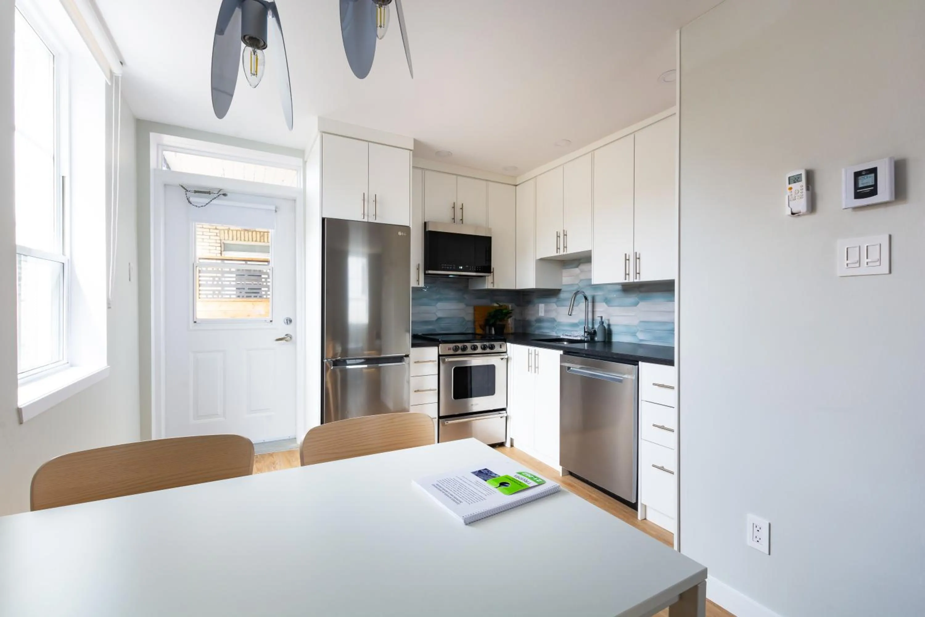 Kitchen or kitchenette in Appart hôtel Le Saint-Anselme