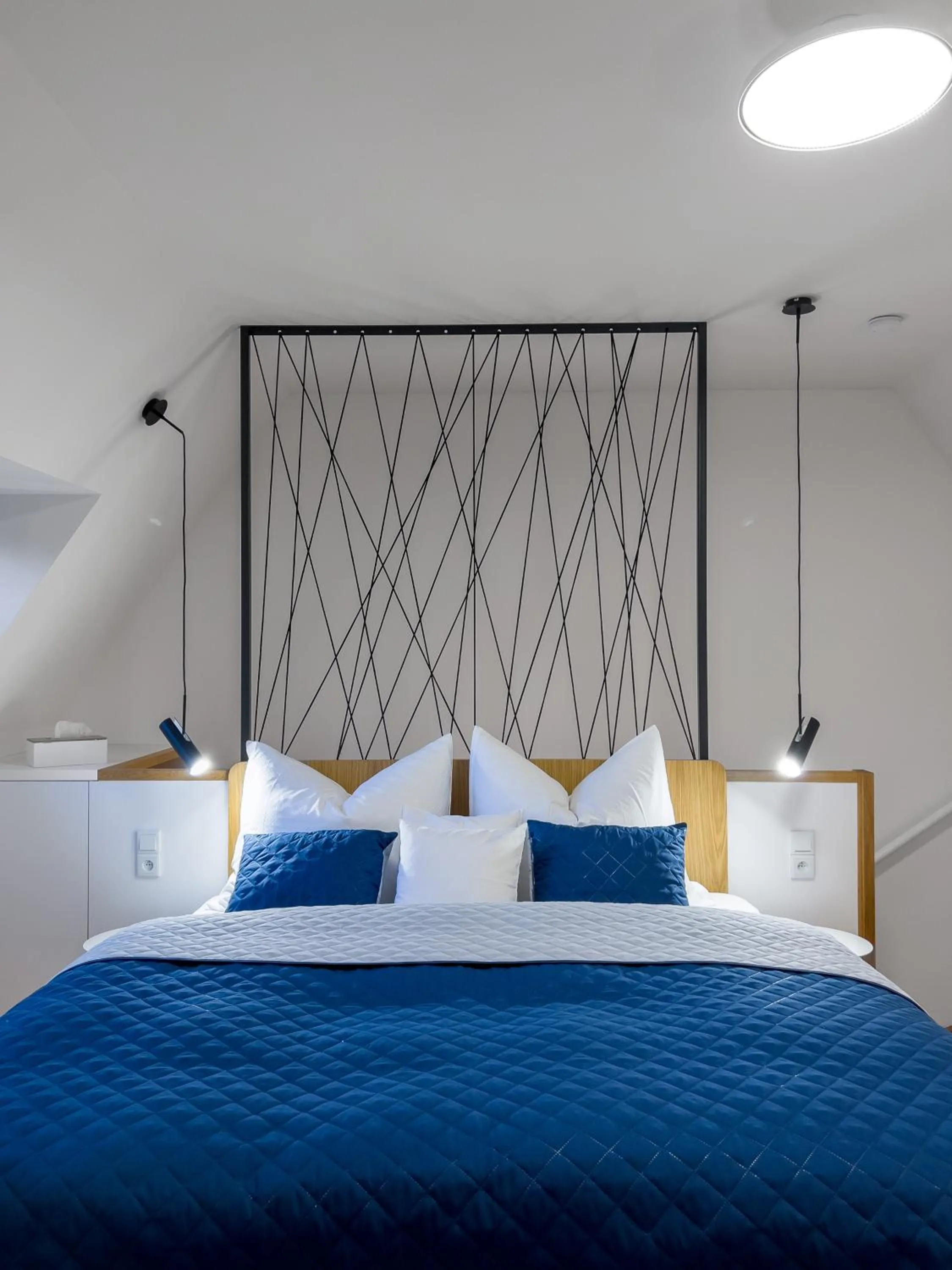 Bed in Old Town Museum Apartment