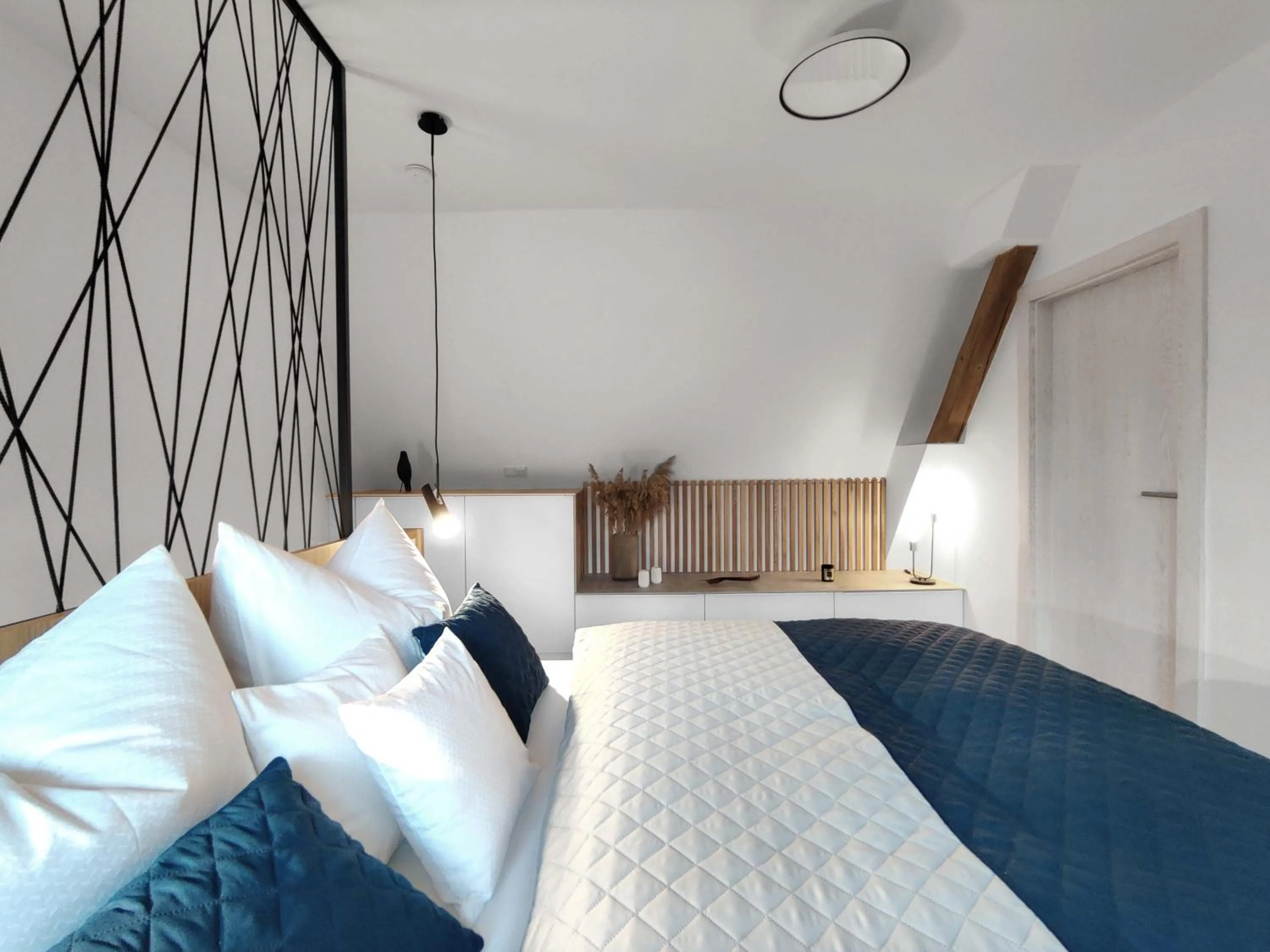 Bed in Old Town Museum Apartment