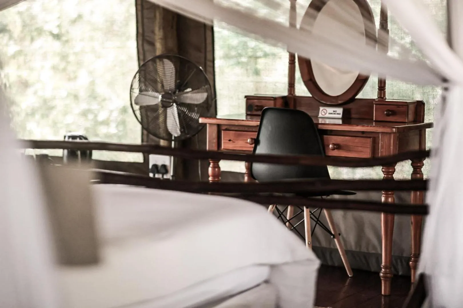 Bed in Muweti Bush Lodge