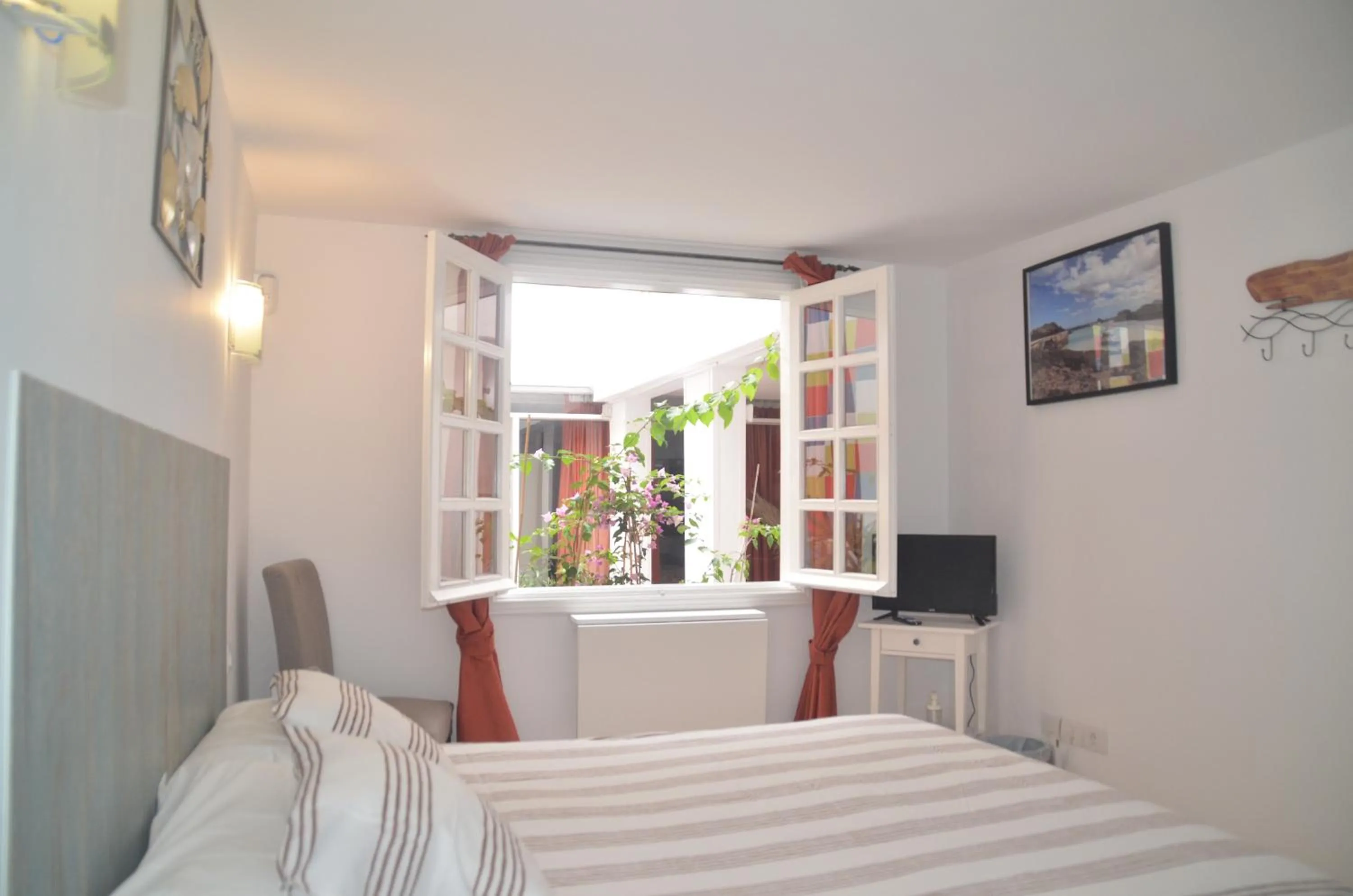 View (from property/room), Bed in HOTELITO RURAL GA7COLORES only adult