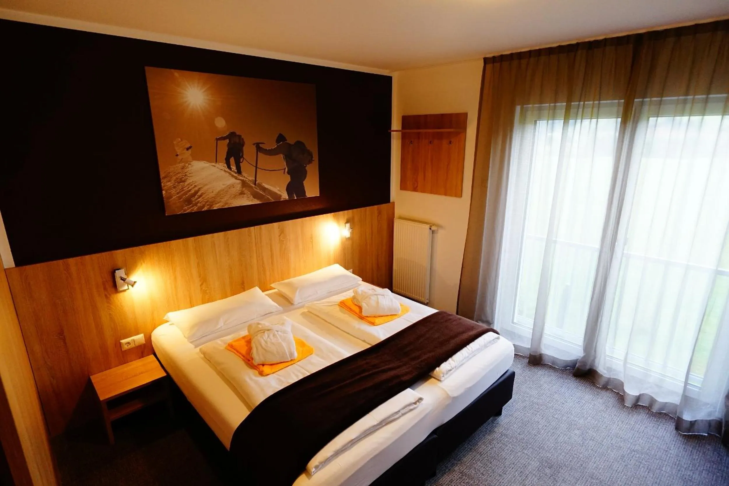 Photo of the whole room, Bed in Fairhotel Hochfilzen B&B