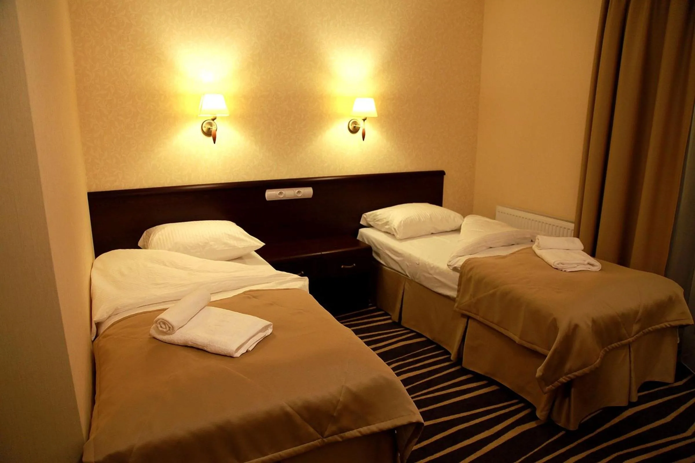 Bed in Hotel Adria