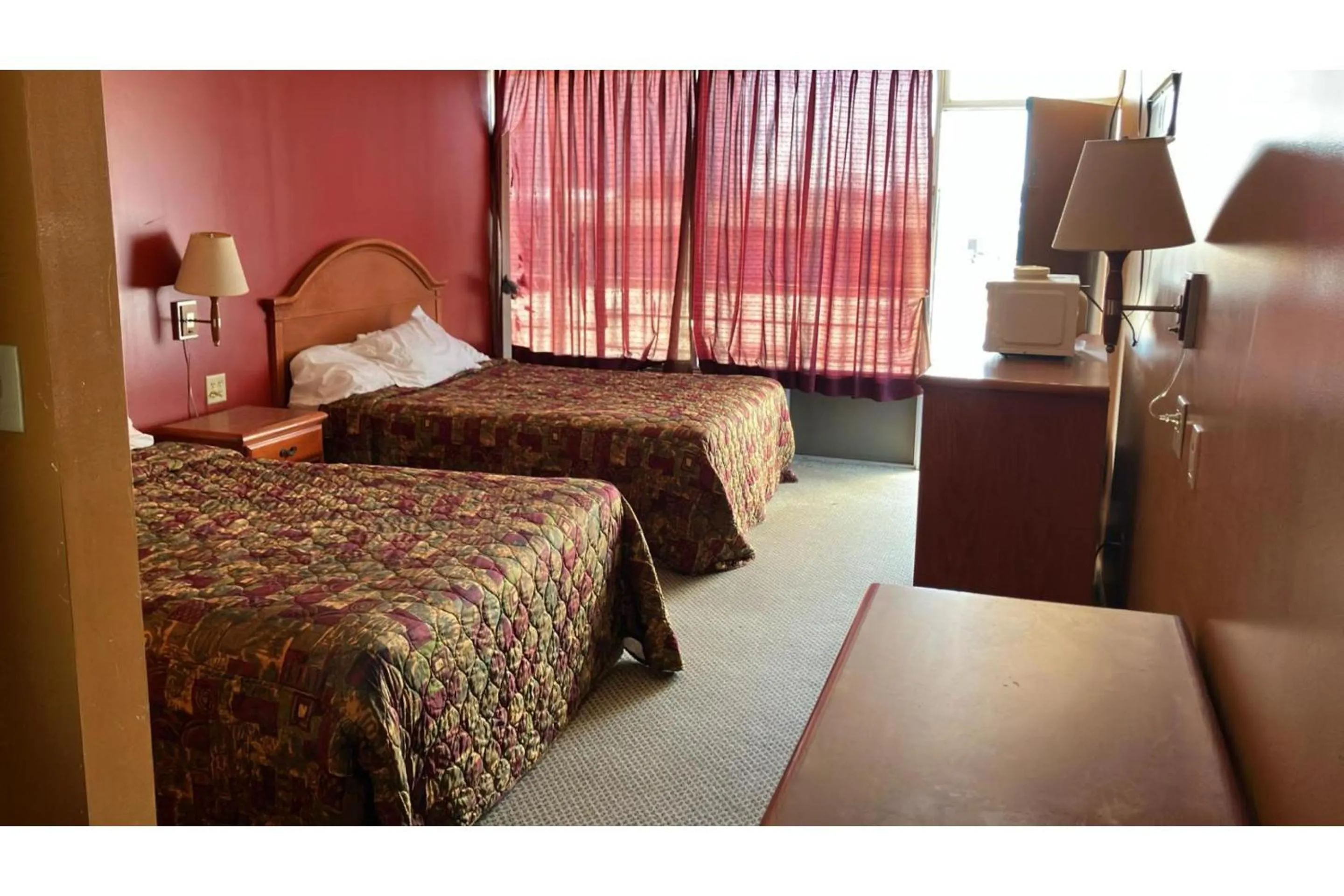 Bedroom in Sky Palace Inn By OYO Anthony KS