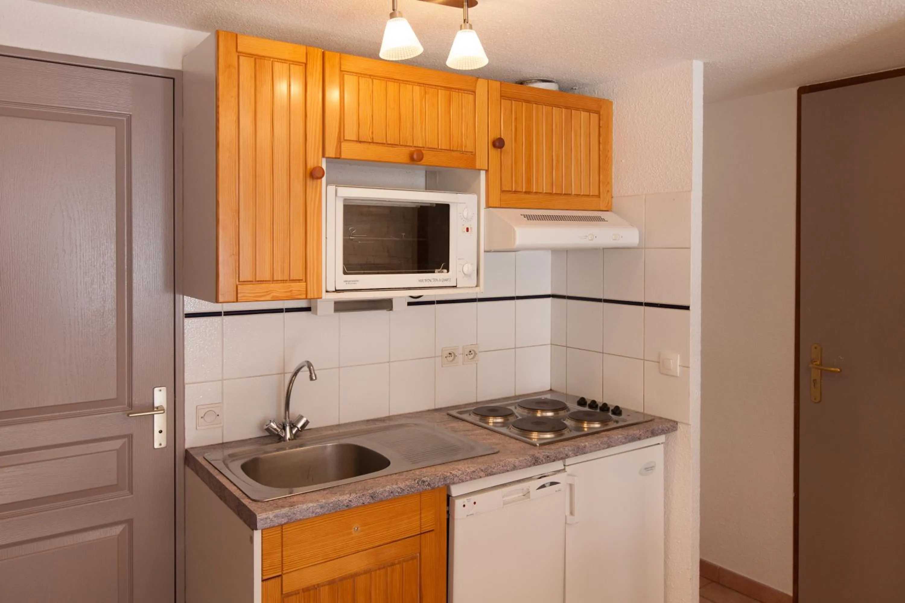 Kitchen or kitchenette in Chalets Jardin Alpin by Mountain Collection Immobilier