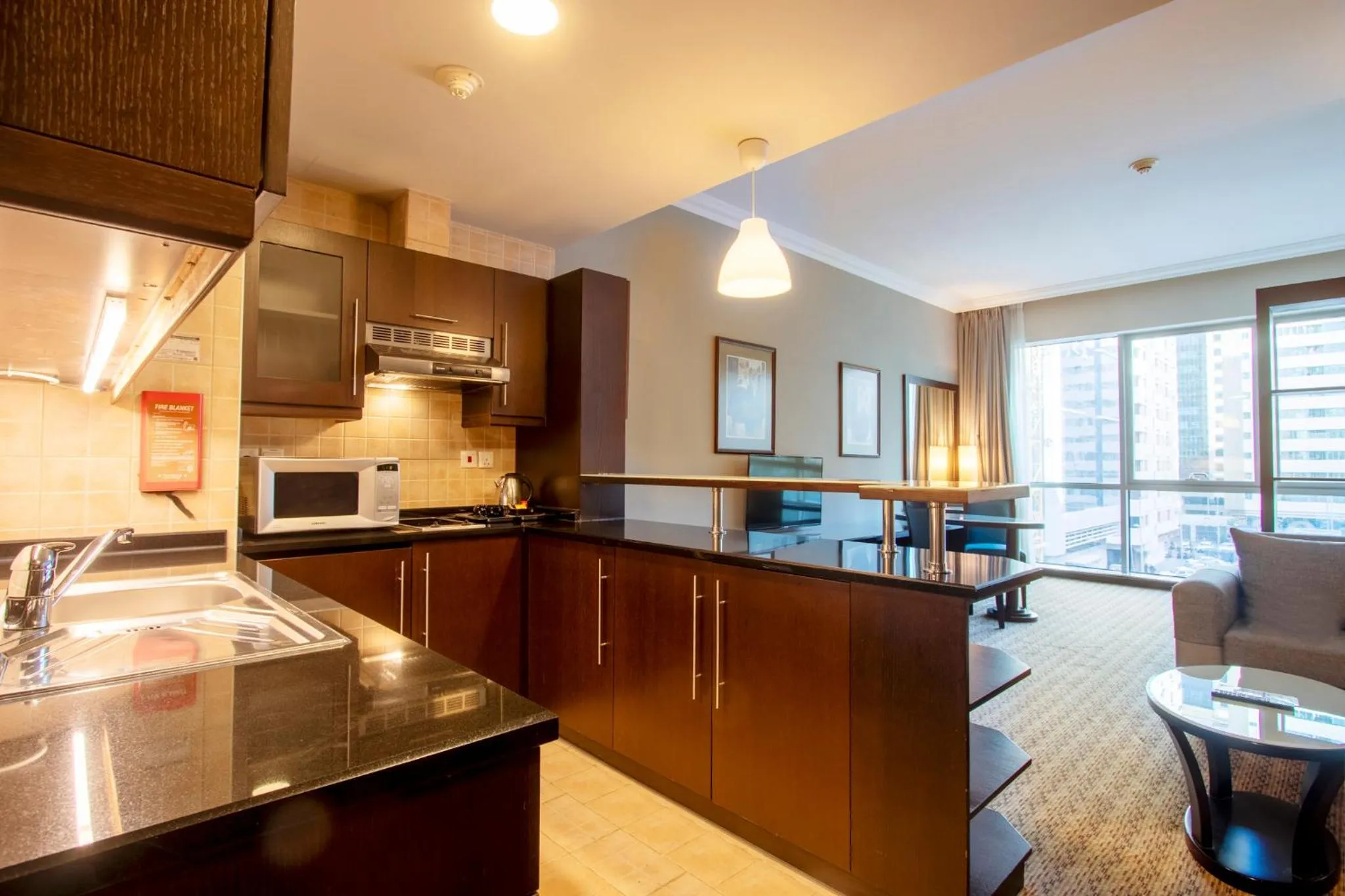 Kitchen or kitchenette in Al Manzel Hotel Apartments