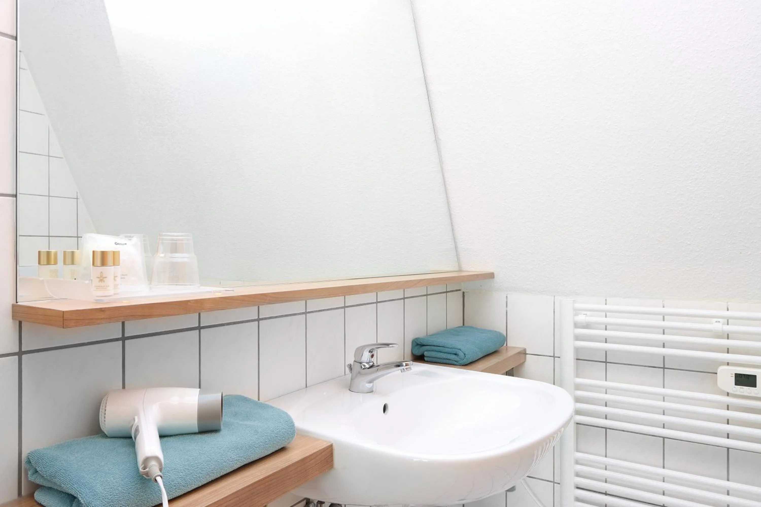 Bathroom in Parkhotel Flora