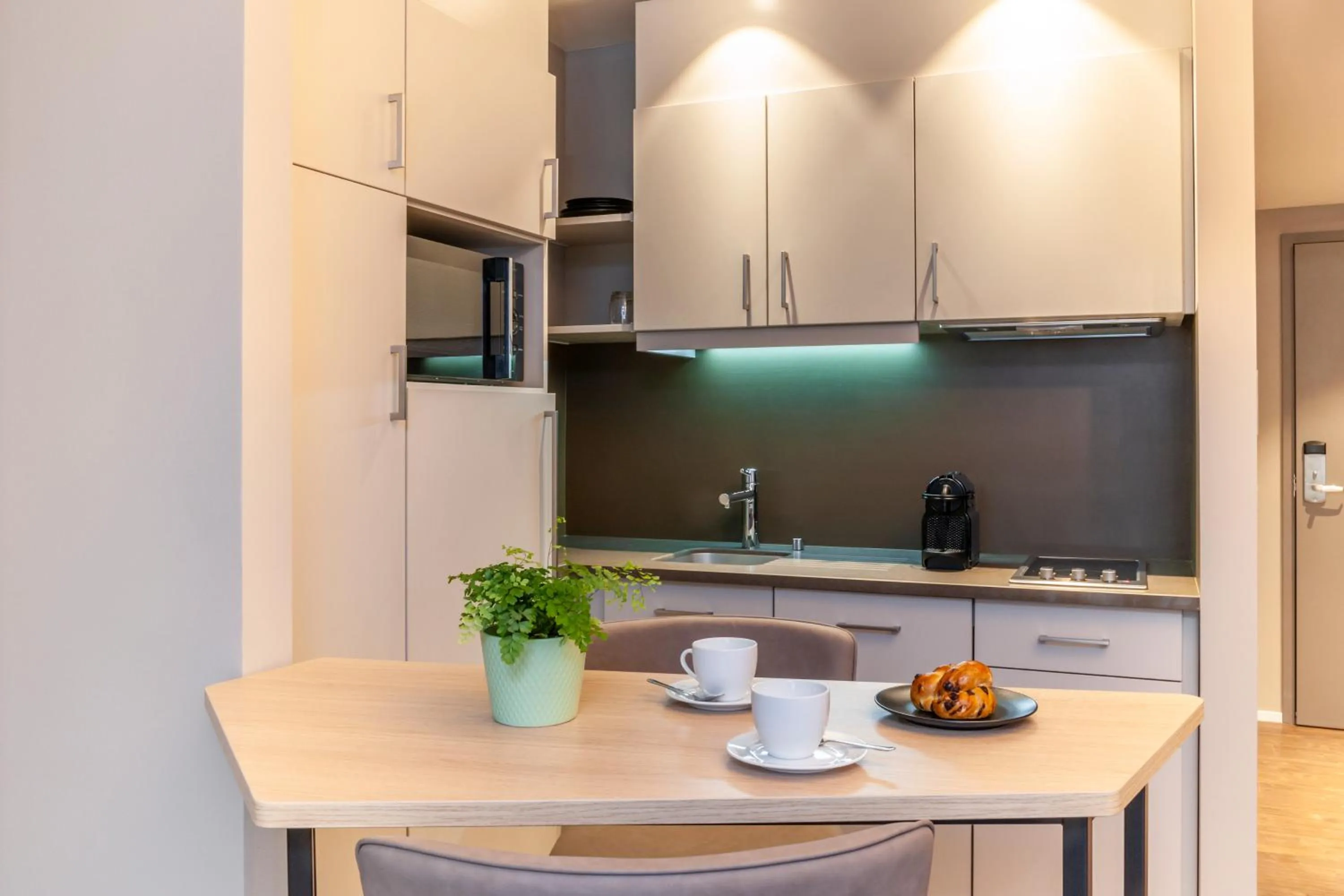 Kitchen or kitchenette in Aparthotel Adagio Zurich City Center