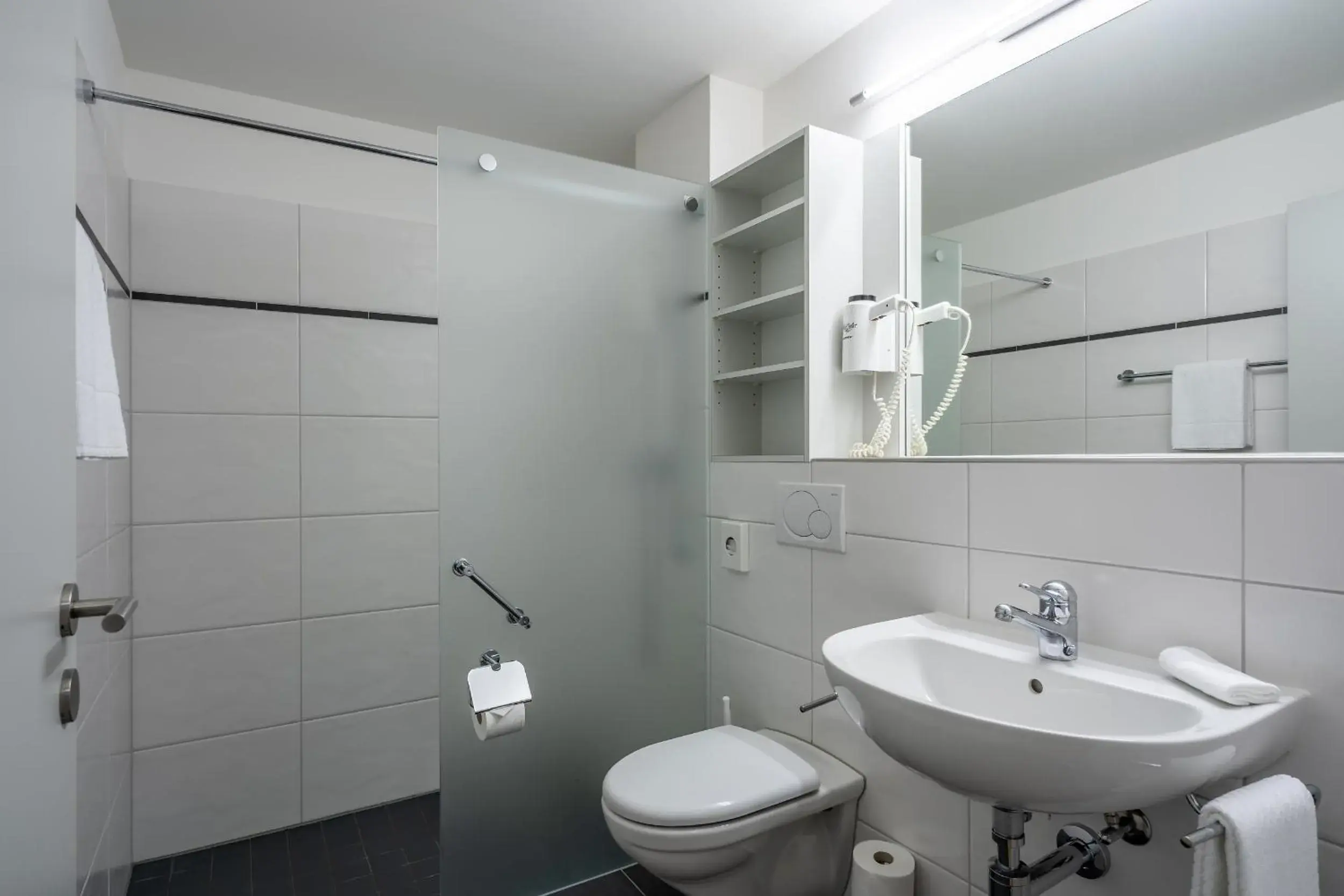 Bathroom in Hotel Artos Interlaken Bathroom in Hotel Artos Interlaken