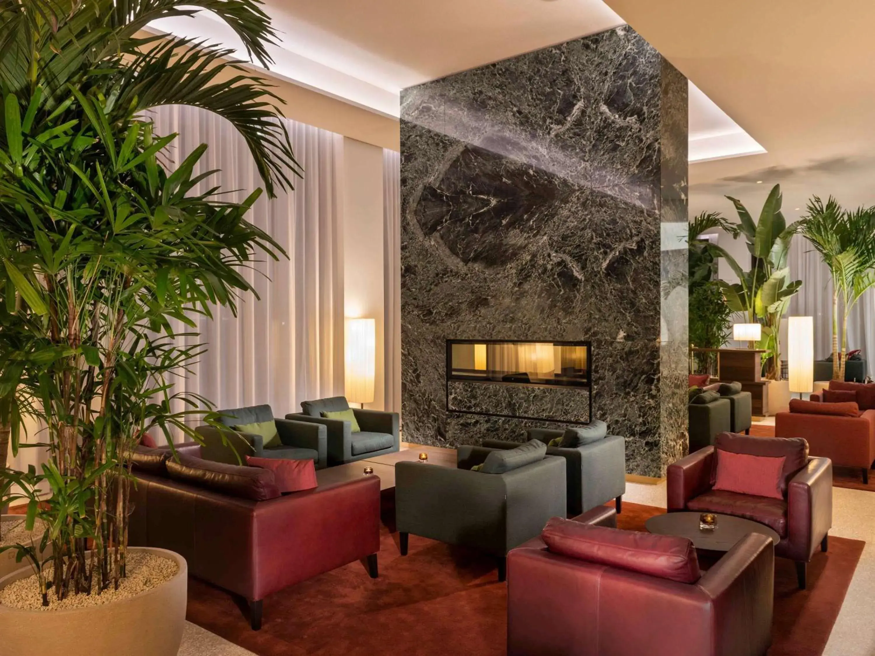 Lounge or bar in Mövenpick Hotel Basel Lounge or bar in Mövenpick Hotel Basel