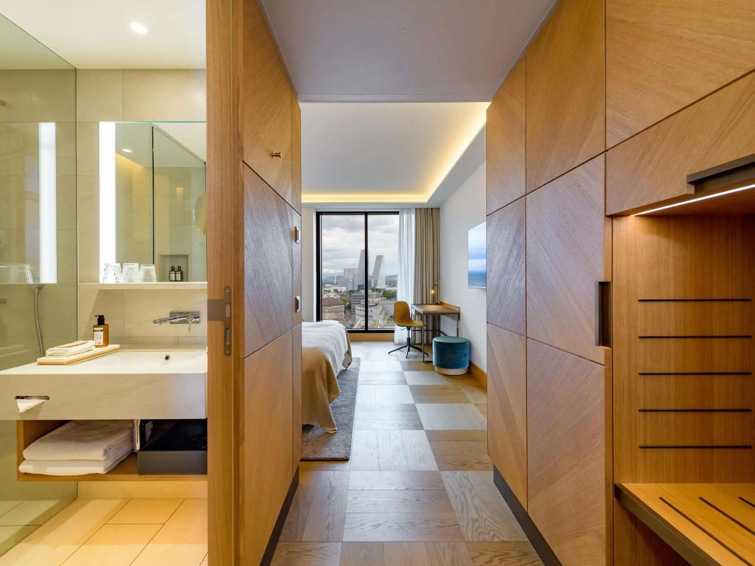 Bedroom in Mövenpick Hotel Basel Bedroom in Mövenpick Hotel Basel