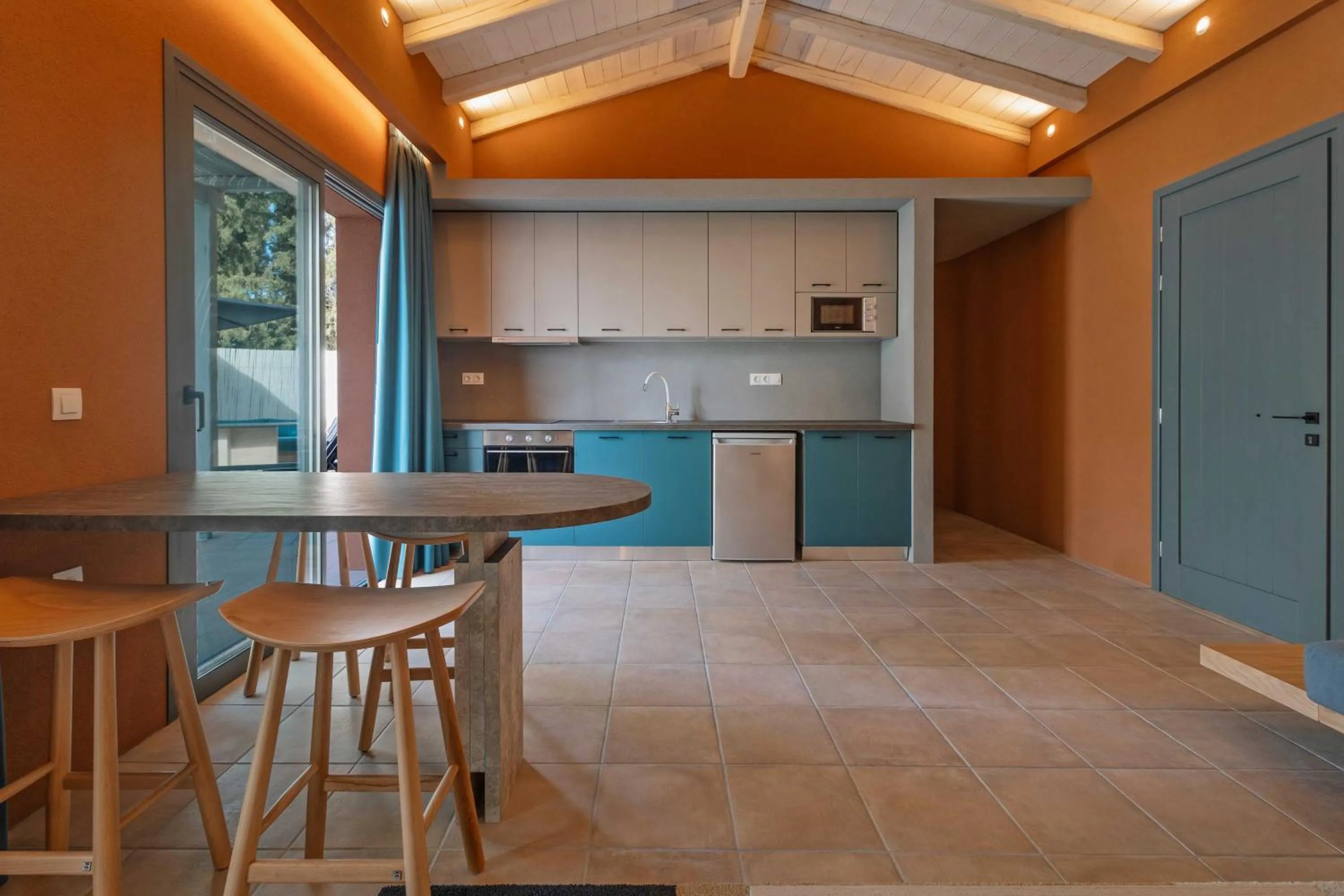 Seating area in Tessera Villas & Studios Collection