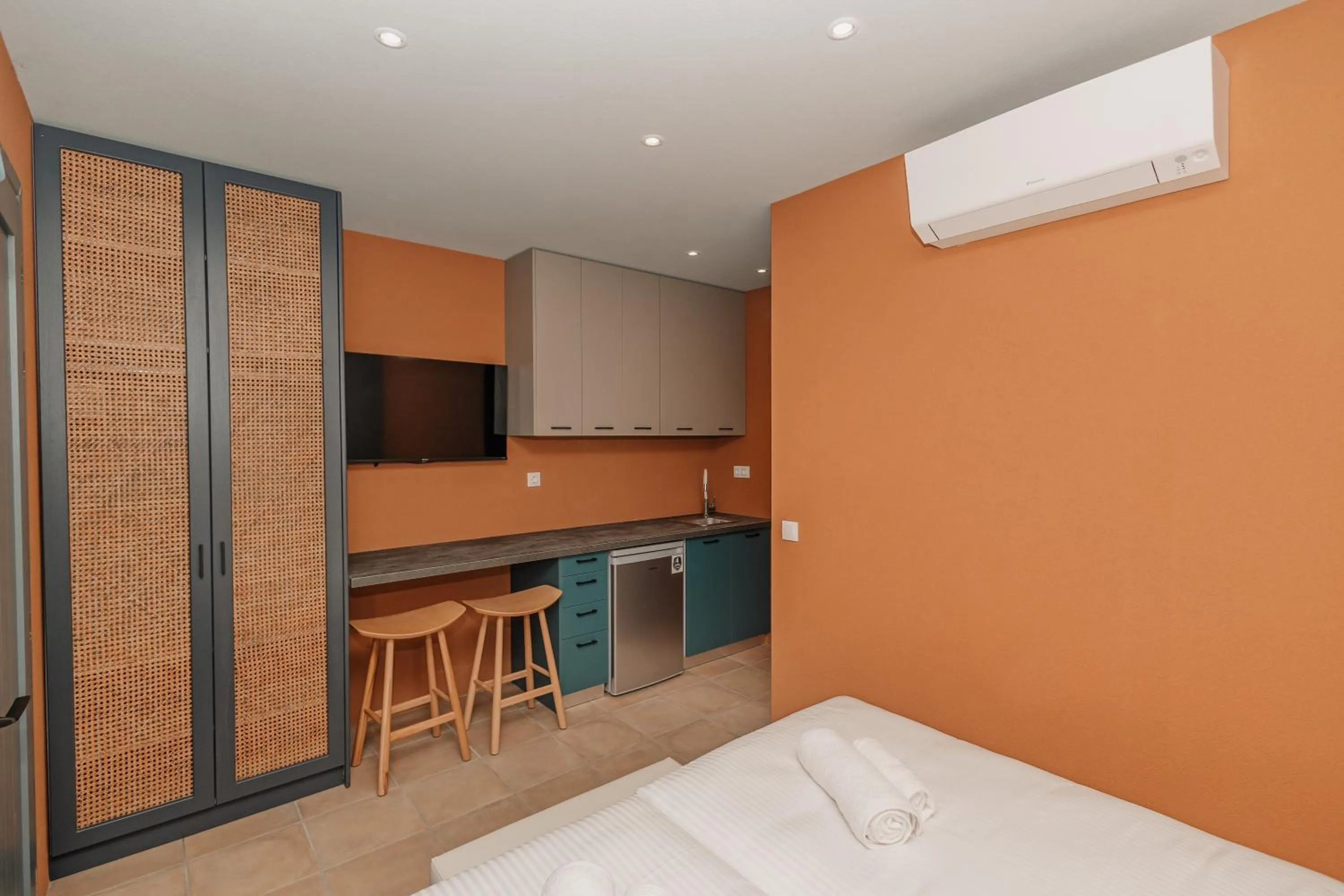 Bed in Tessera Villas & Studios Collection