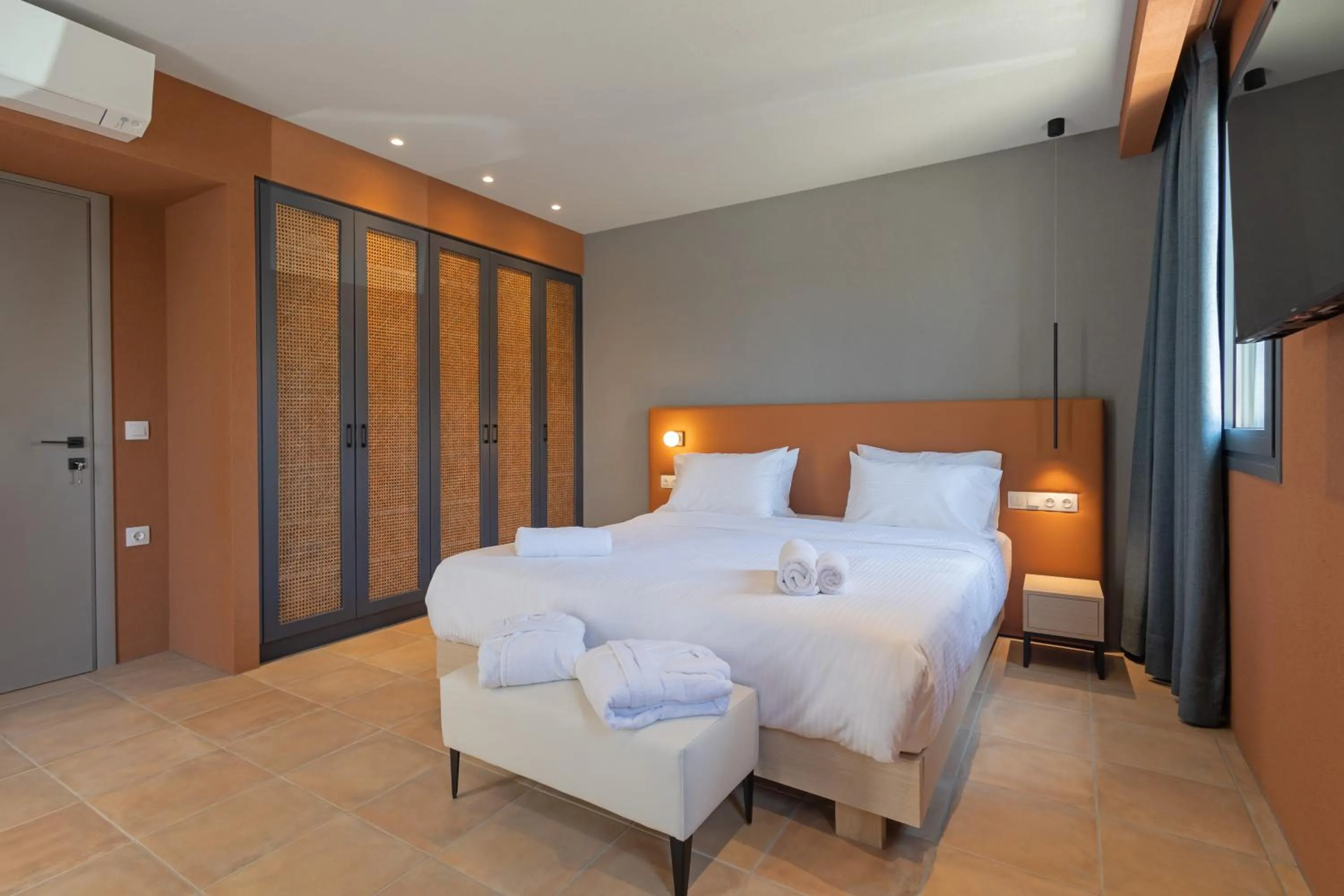 Bed in Tessera Villas & Studios Collection