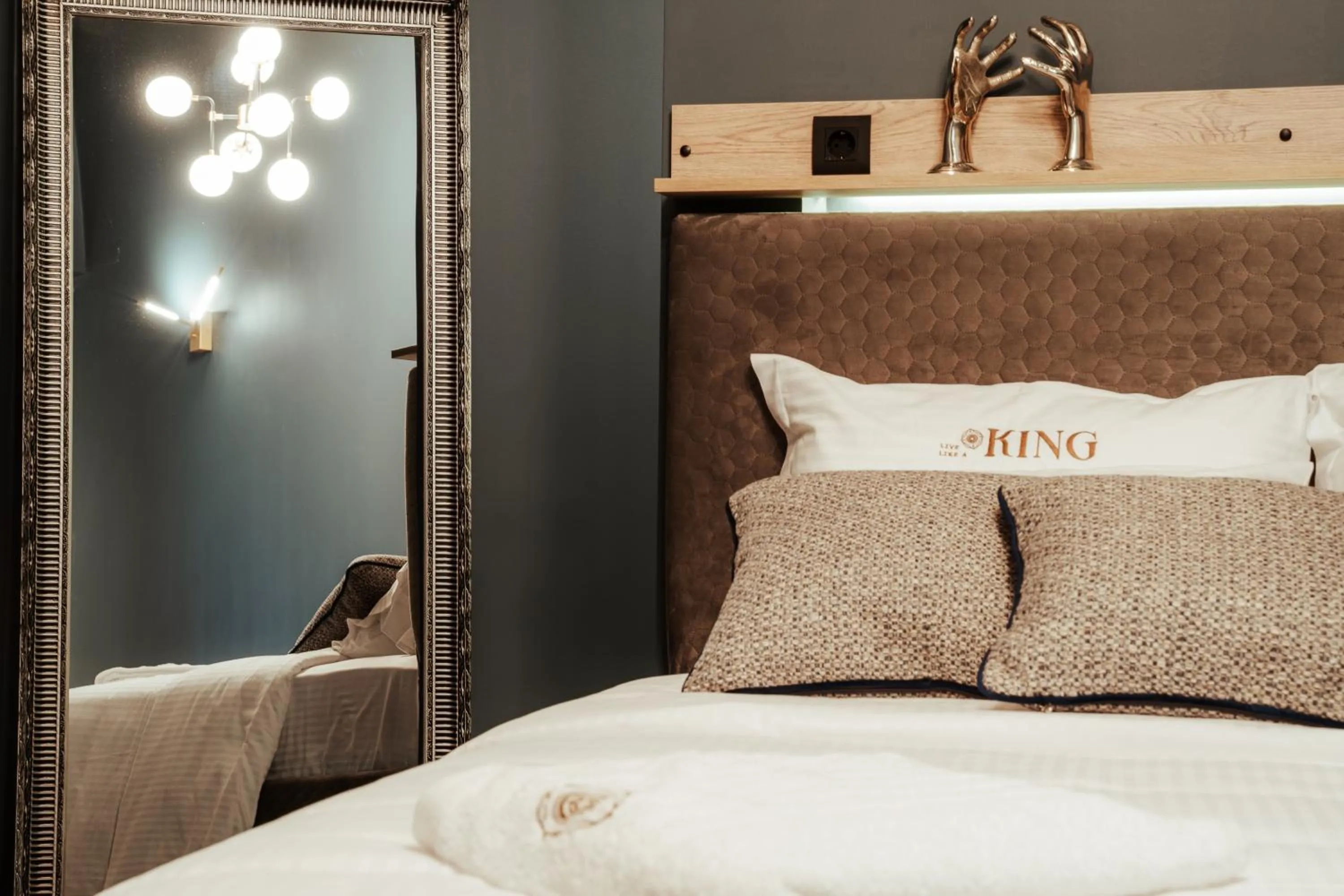 Bed in Espero Royal Stay