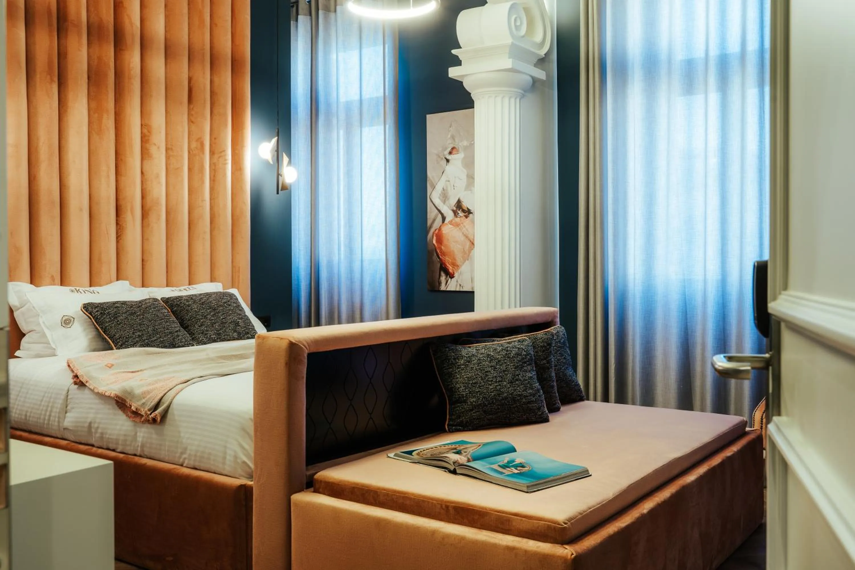 Seating area, Bed in Espero Royal Stay