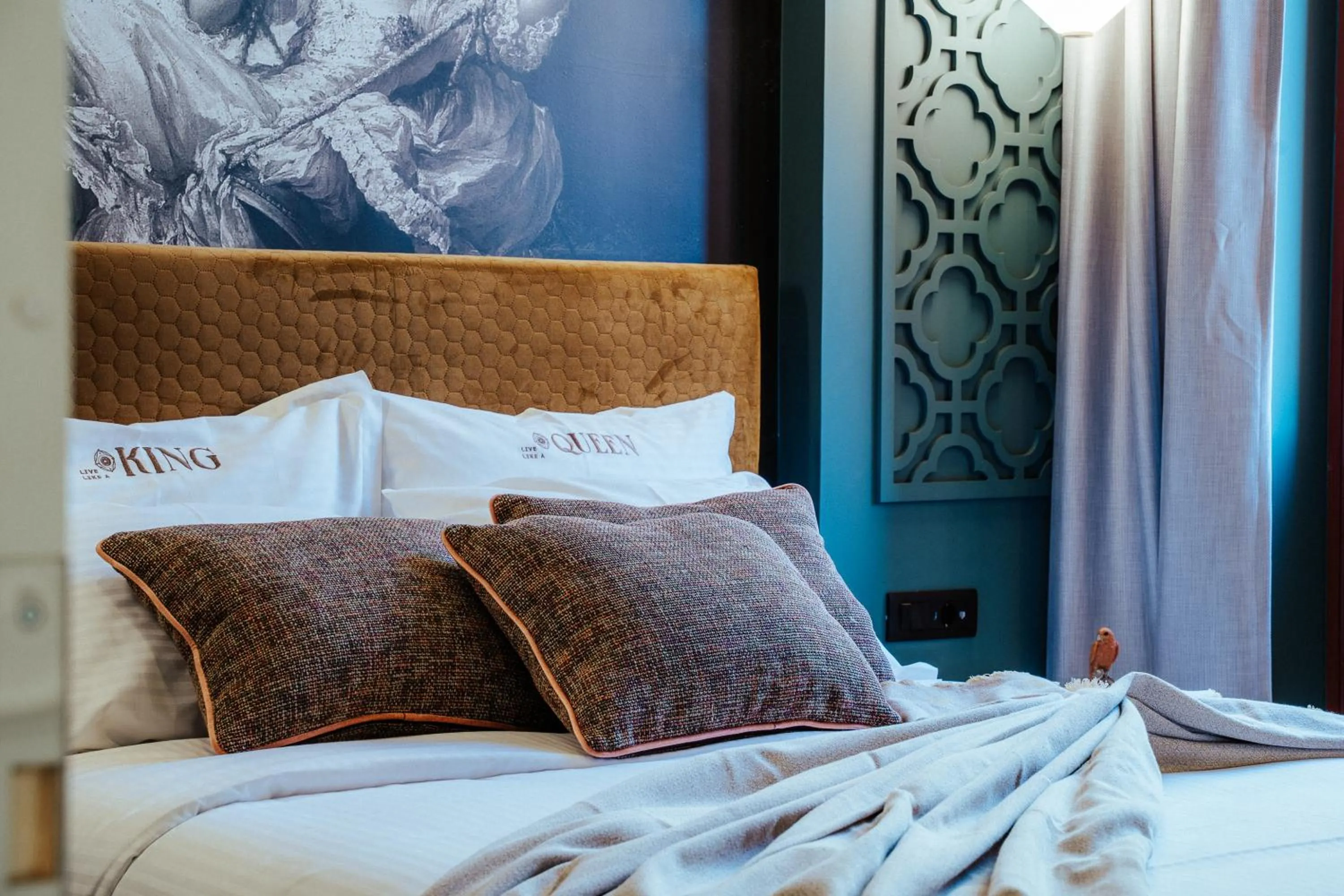 Bed in Espero Royal Stay