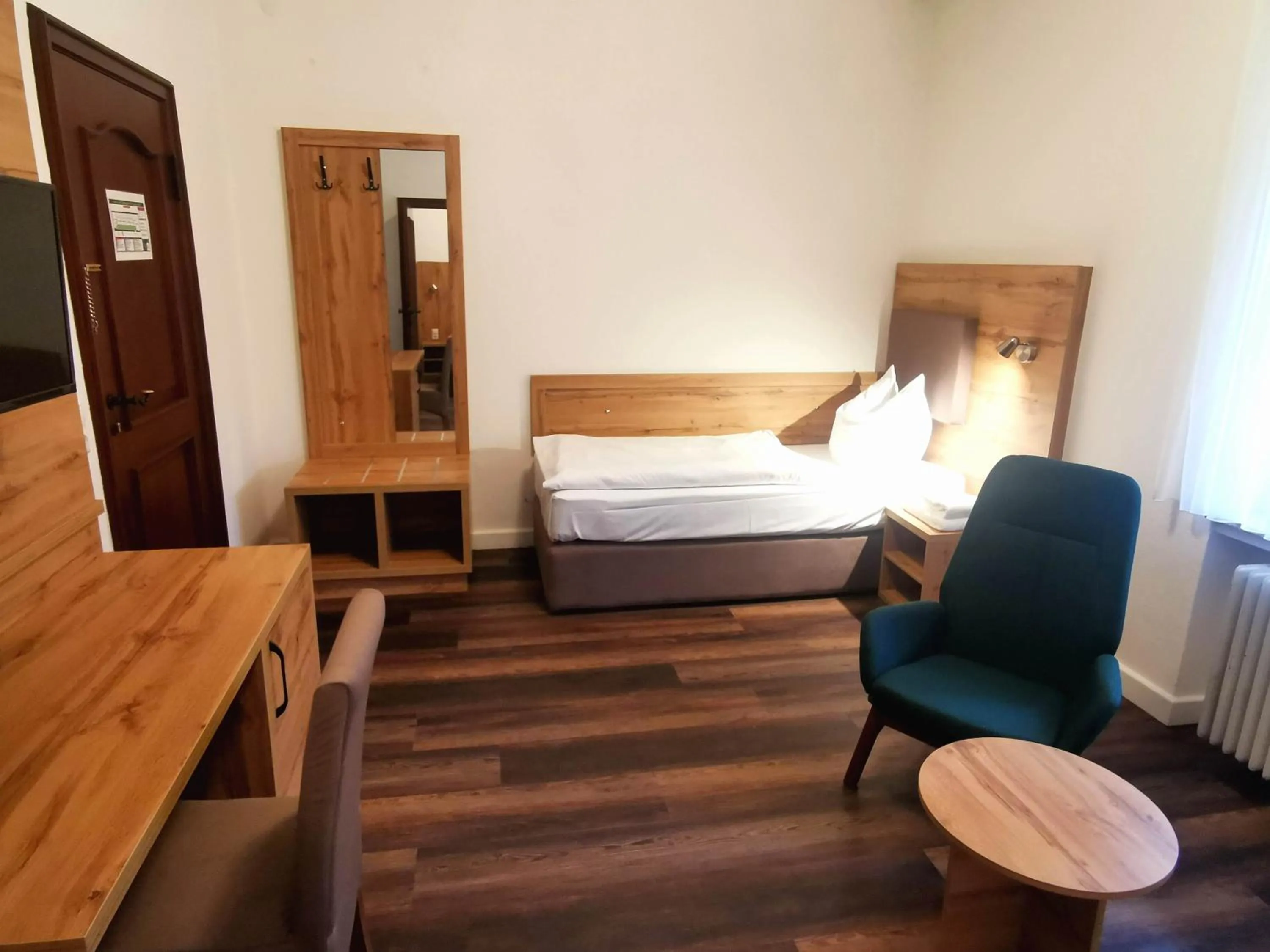 Photo of the whole room, Bed in Heidehotel Soltauer Hof